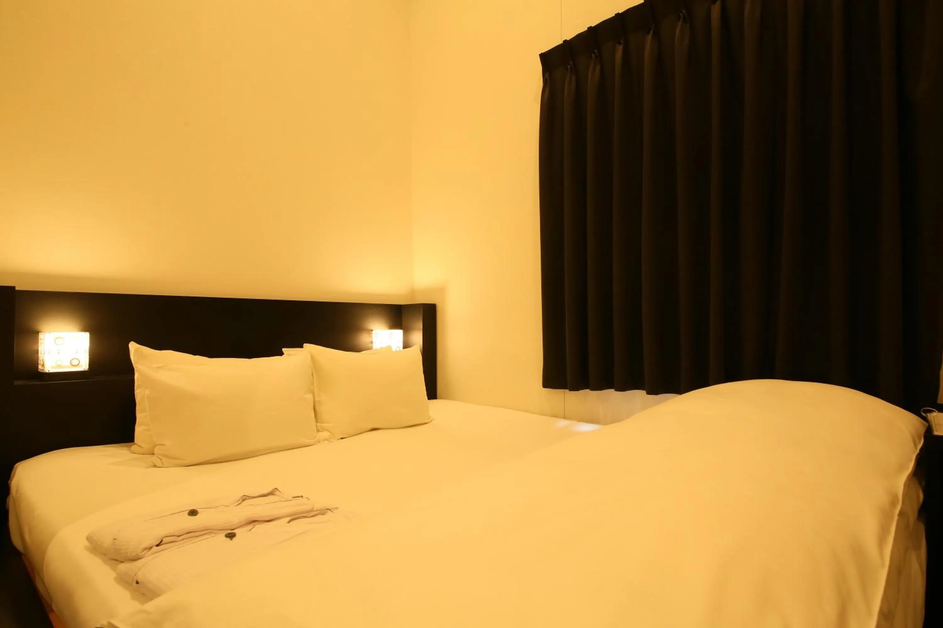 Bed in HOTEL TRAD Replay