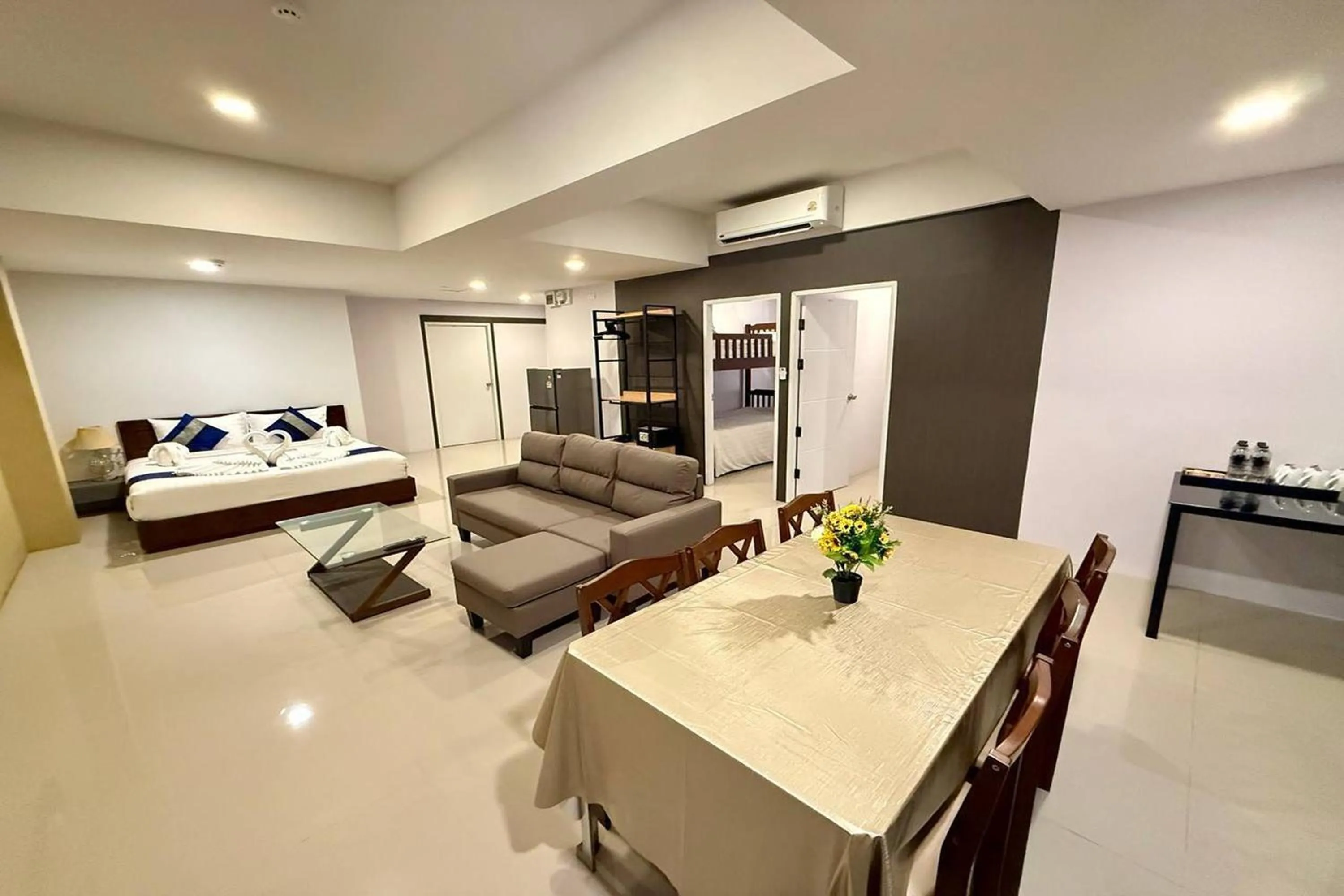 Living room, Bed in The Thames Pool Access Resort & Villa - SHA Extra Plus