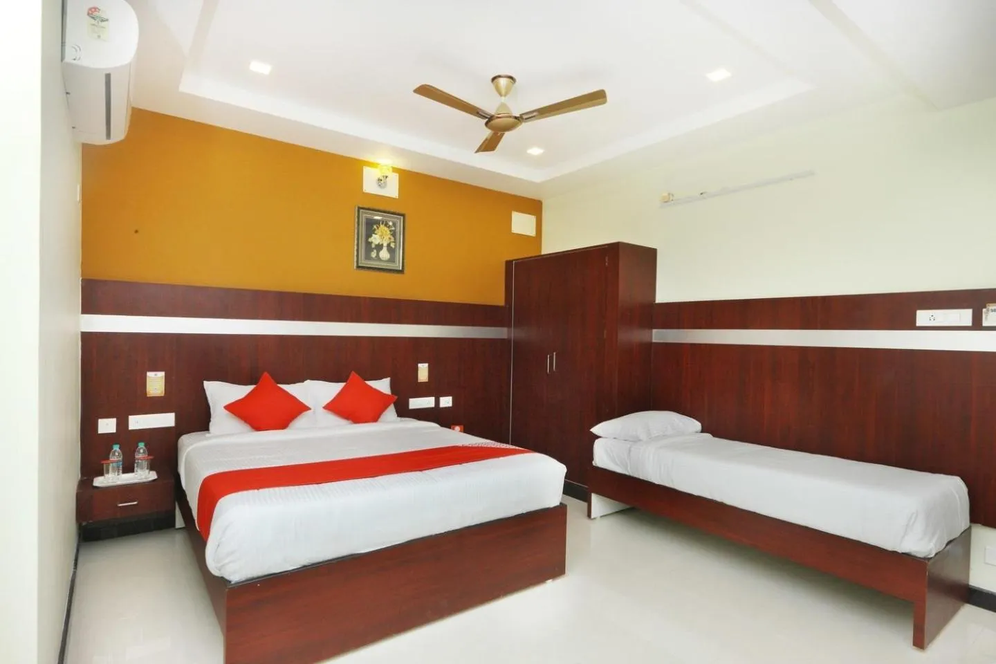 Photo of the whole room, Bed in Hotel Ramcharan Residency, Tirupati