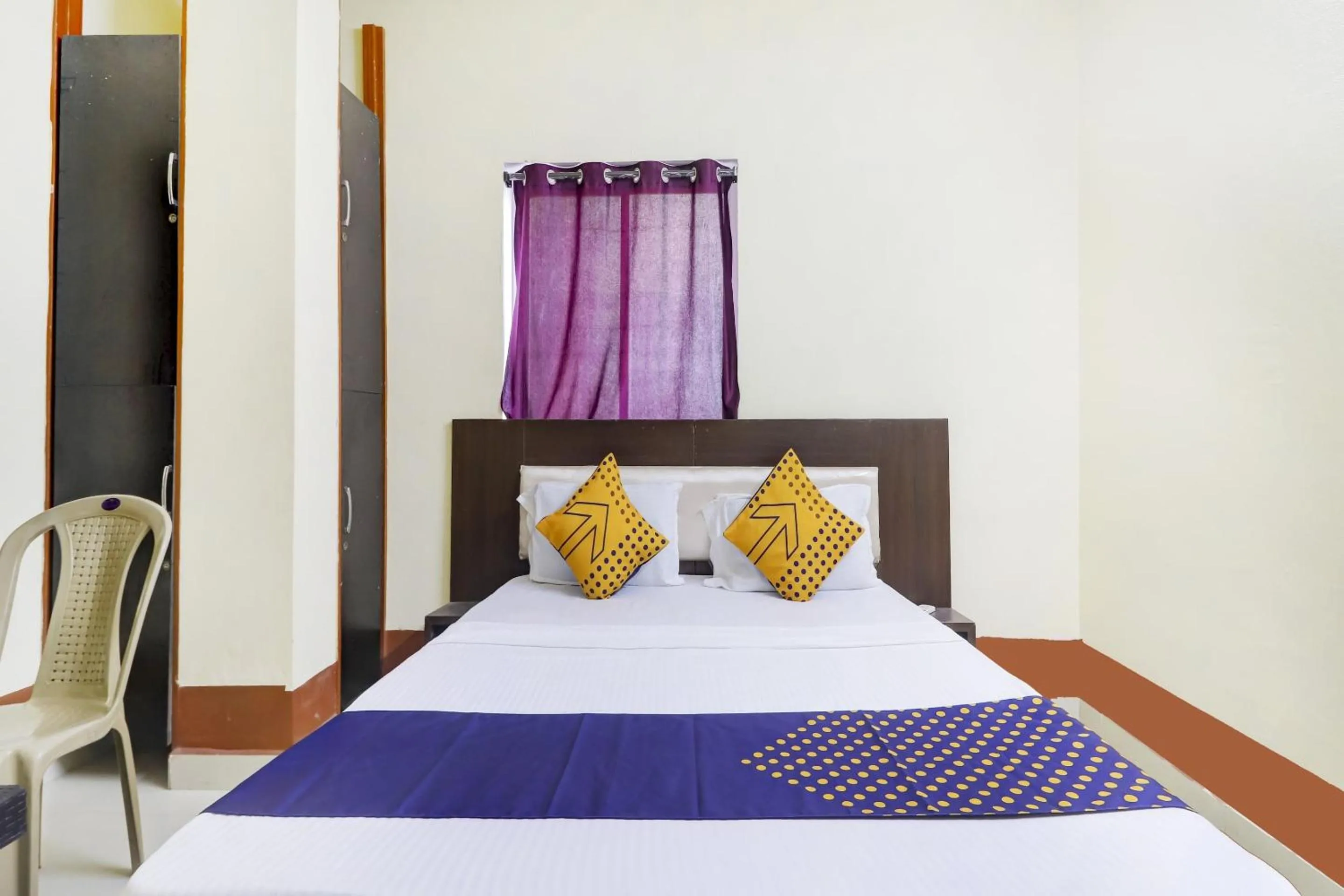 Bedroom in Hotel O Srinidhi Inn