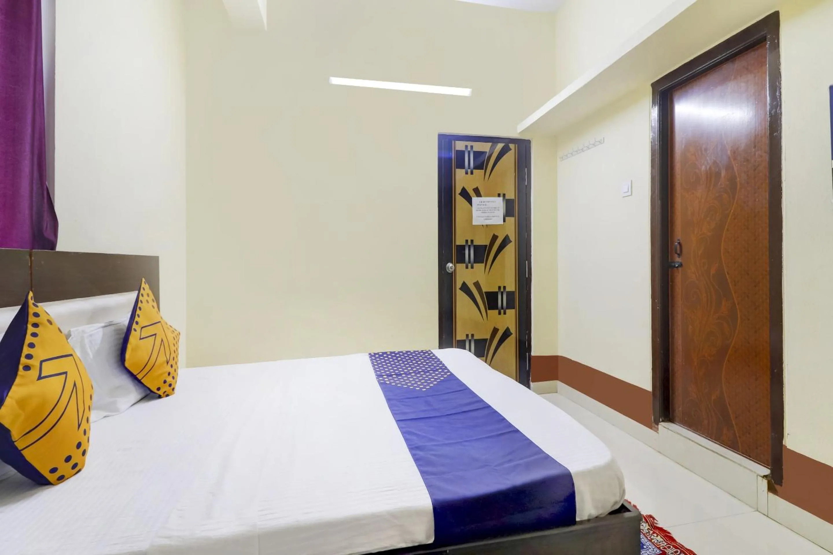 Bedroom in Hotel O Srinidhi Inn