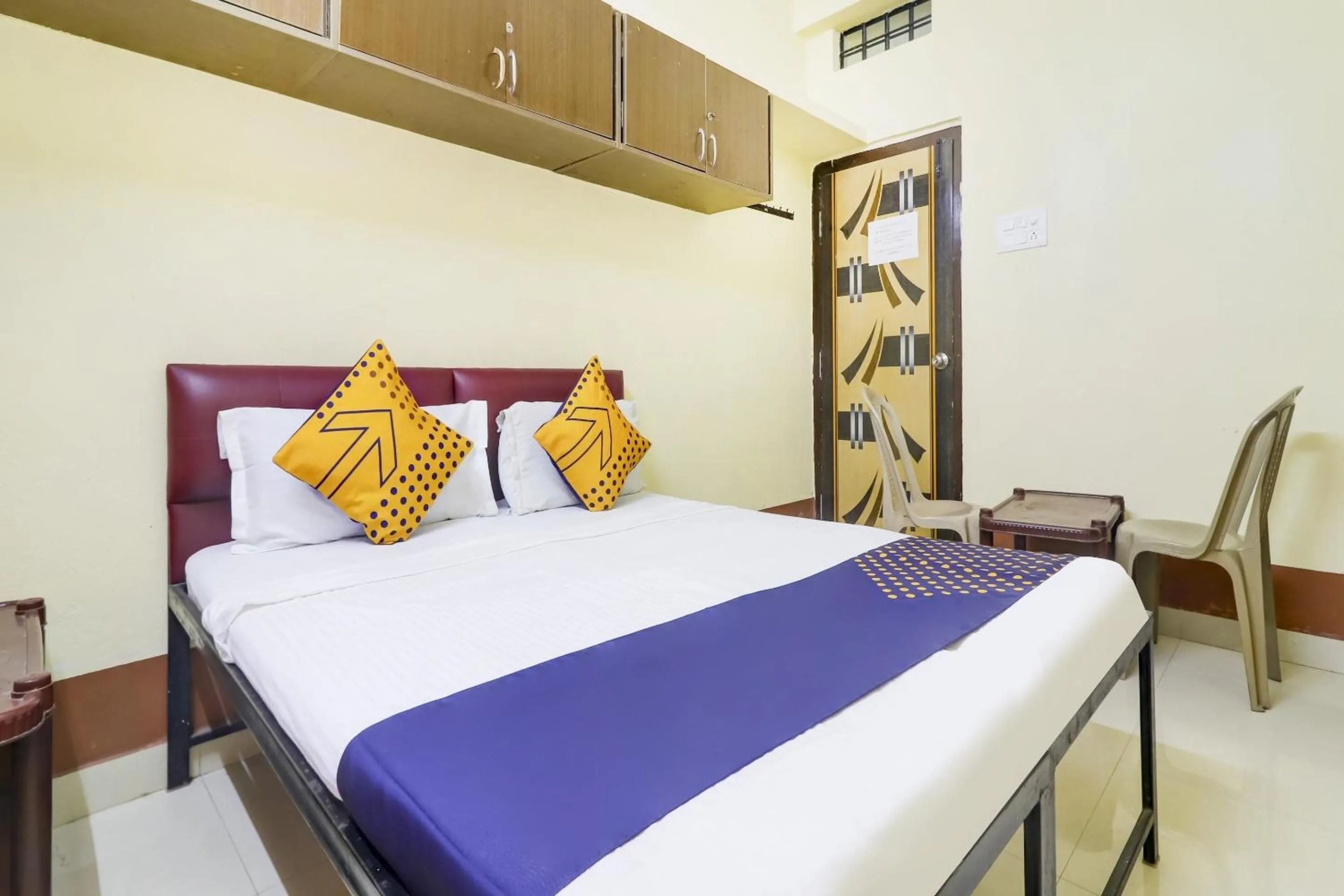 Bedroom in Hotel O Srinidhi Inn
