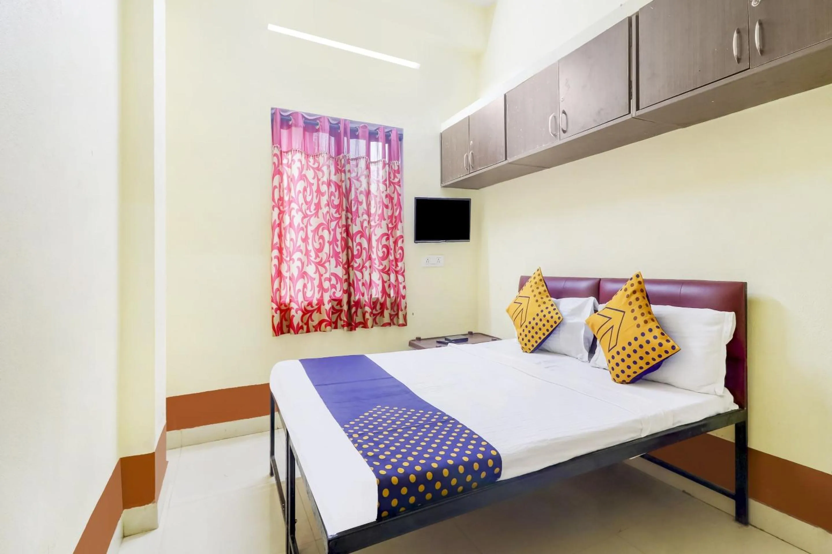 Bedroom in Hotel O Srinidhi Inn