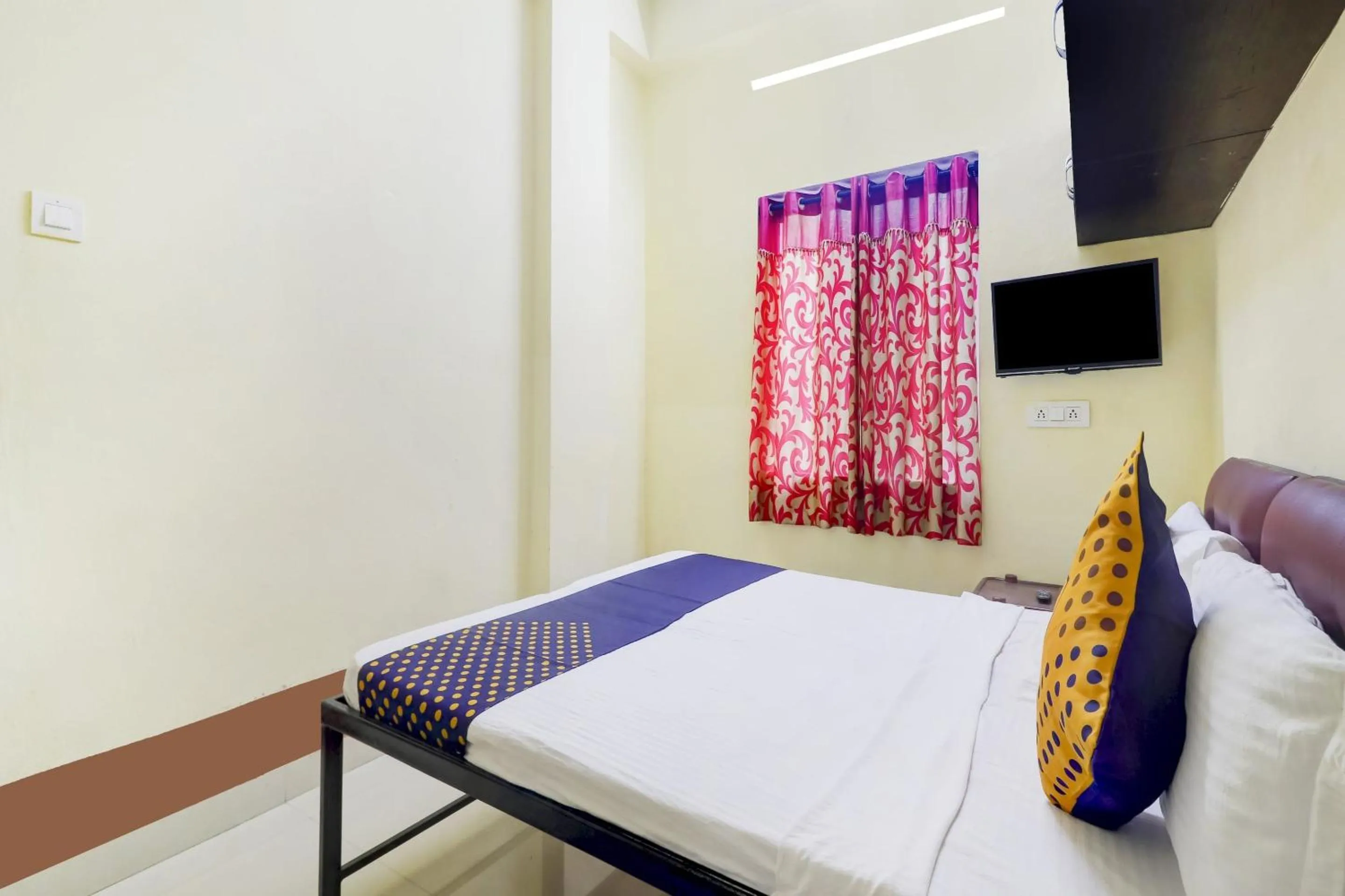 Bedroom in Hotel O Srinidhi Inn