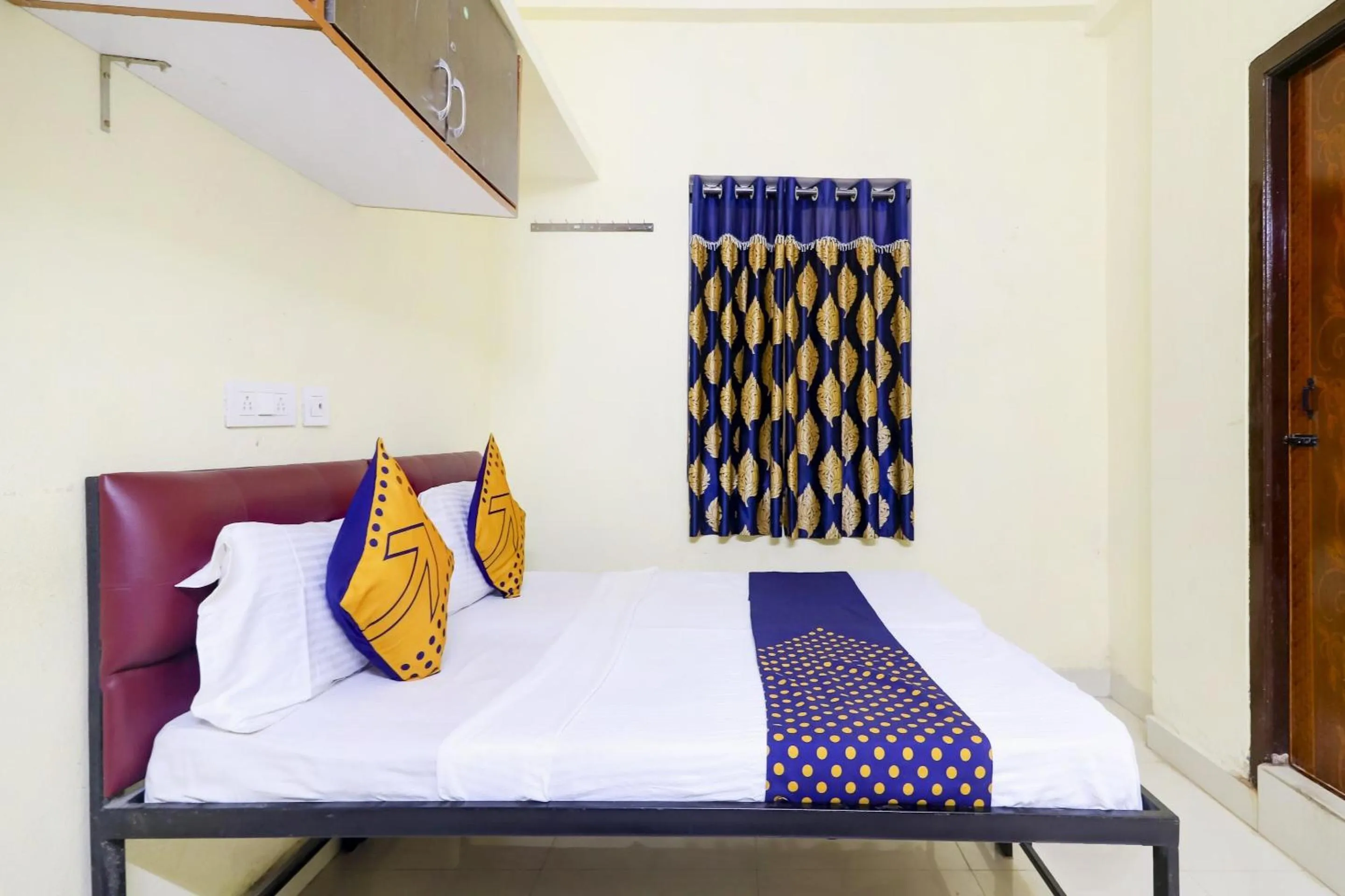 Bedroom in Hotel O Srinidhi Inn