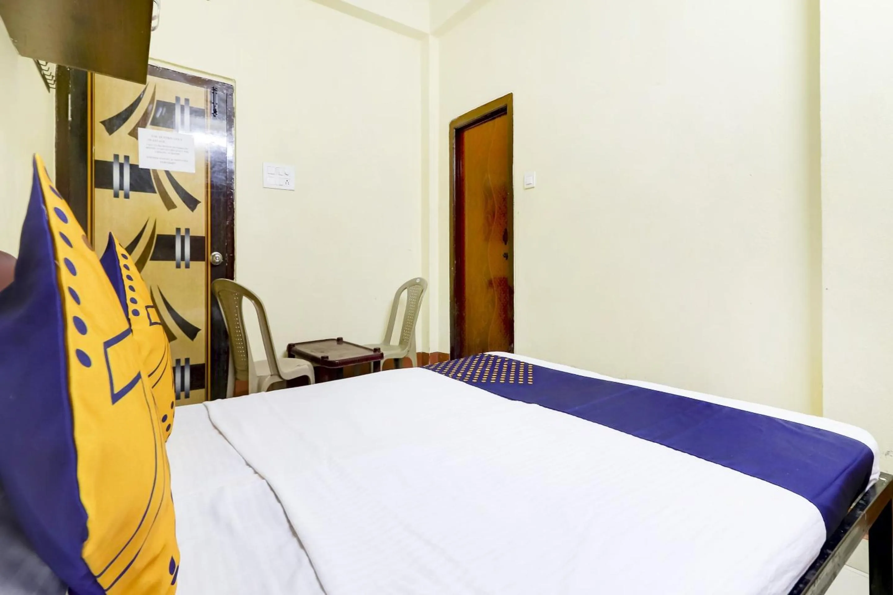 Bedroom in Hotel O Srinidhi Inn