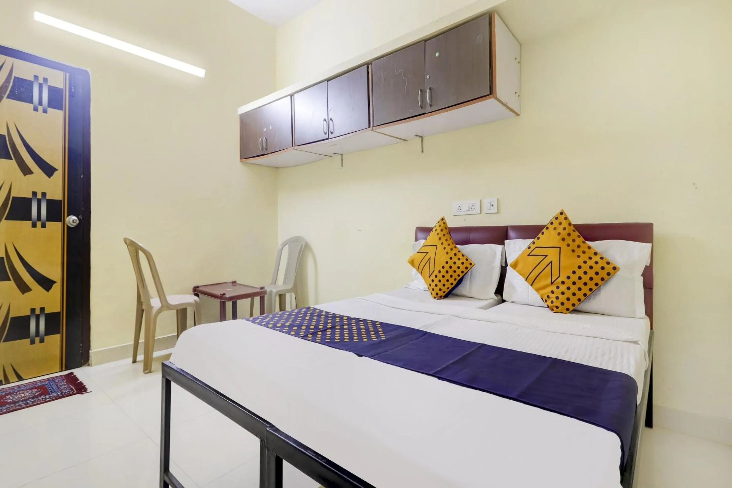 Bedroom in Hotel O Srinidhi Inn