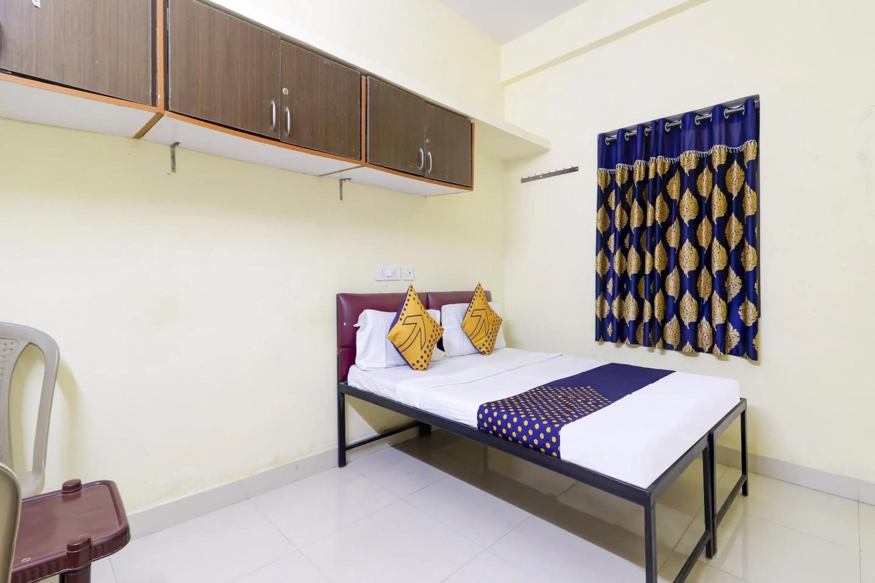 Bedroom in Hotel O Srinidhi Inn