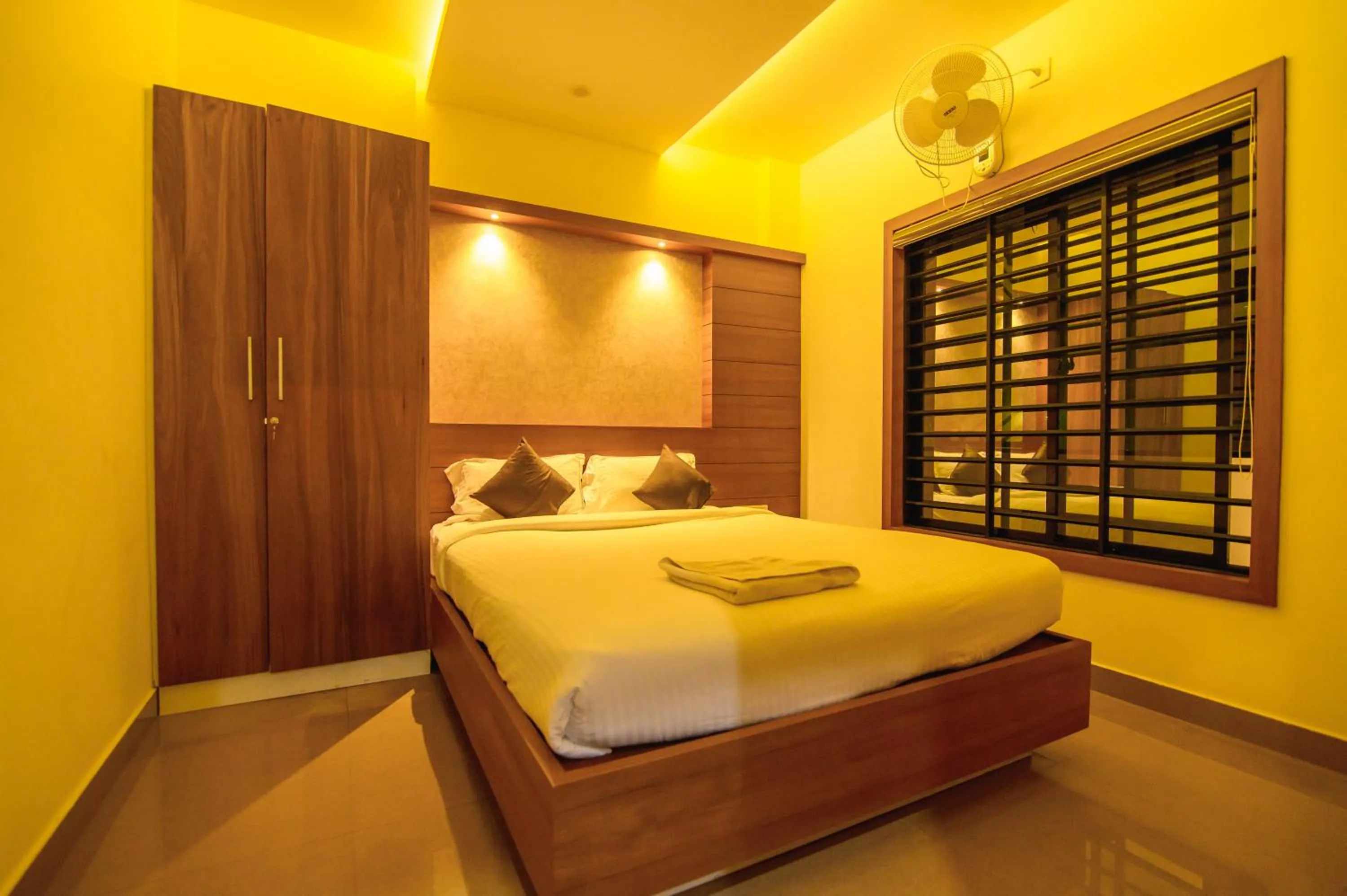 Bed in Royal Plaza Wayanad