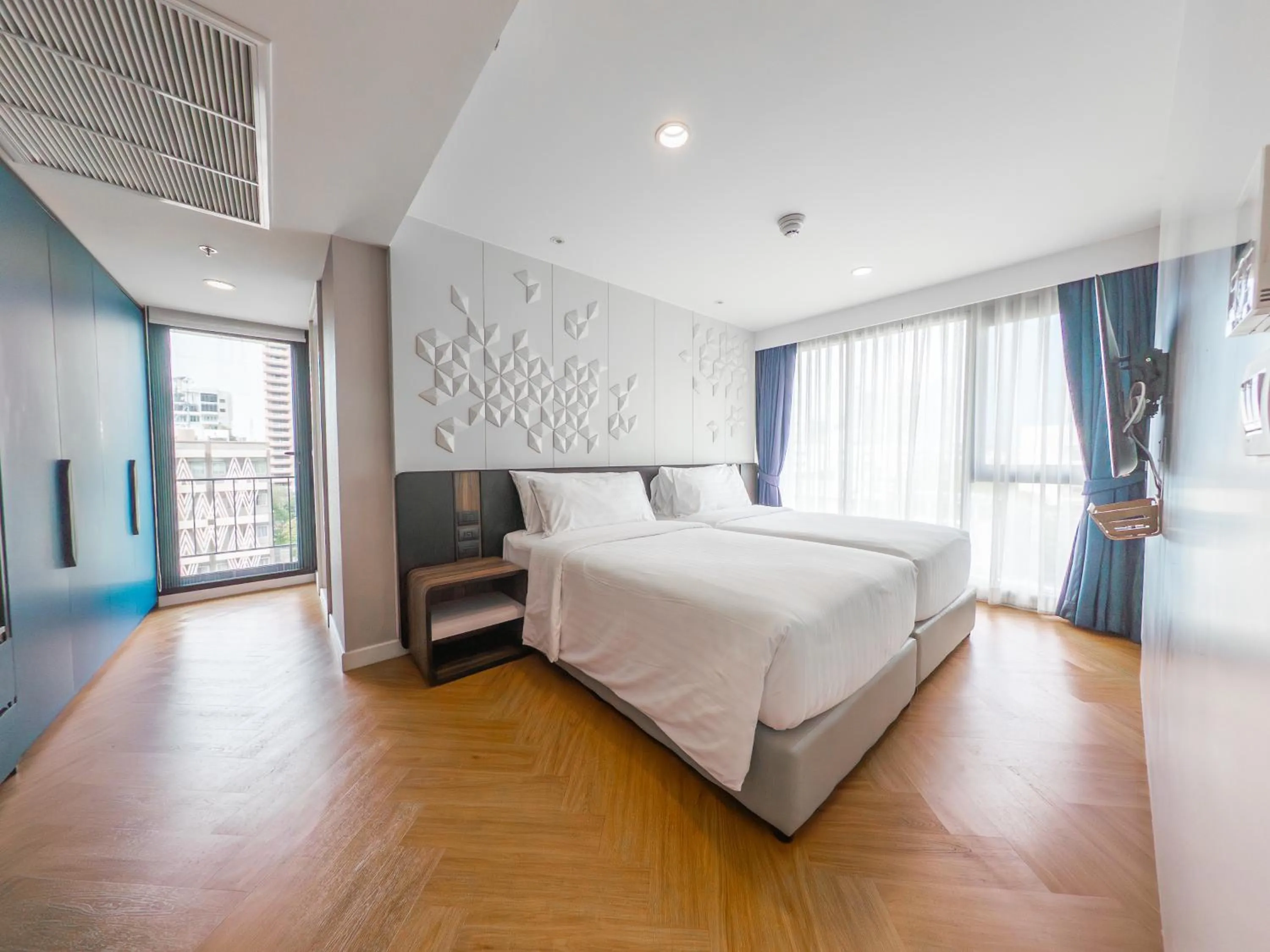 Bed in Amanta Hotel & Residence Sathorn