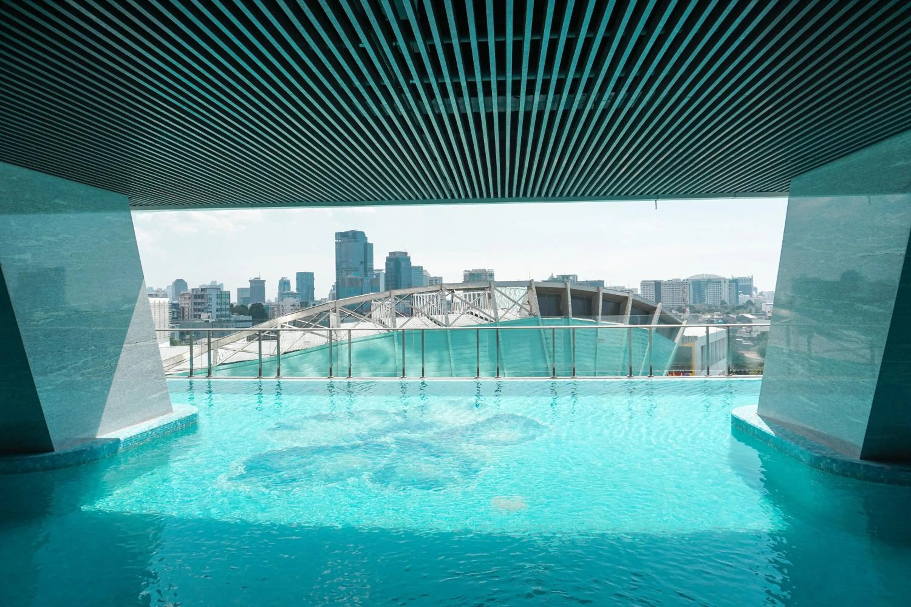 Swimming pool in Comfy Studio Apartment at Menteng Park By Travelio