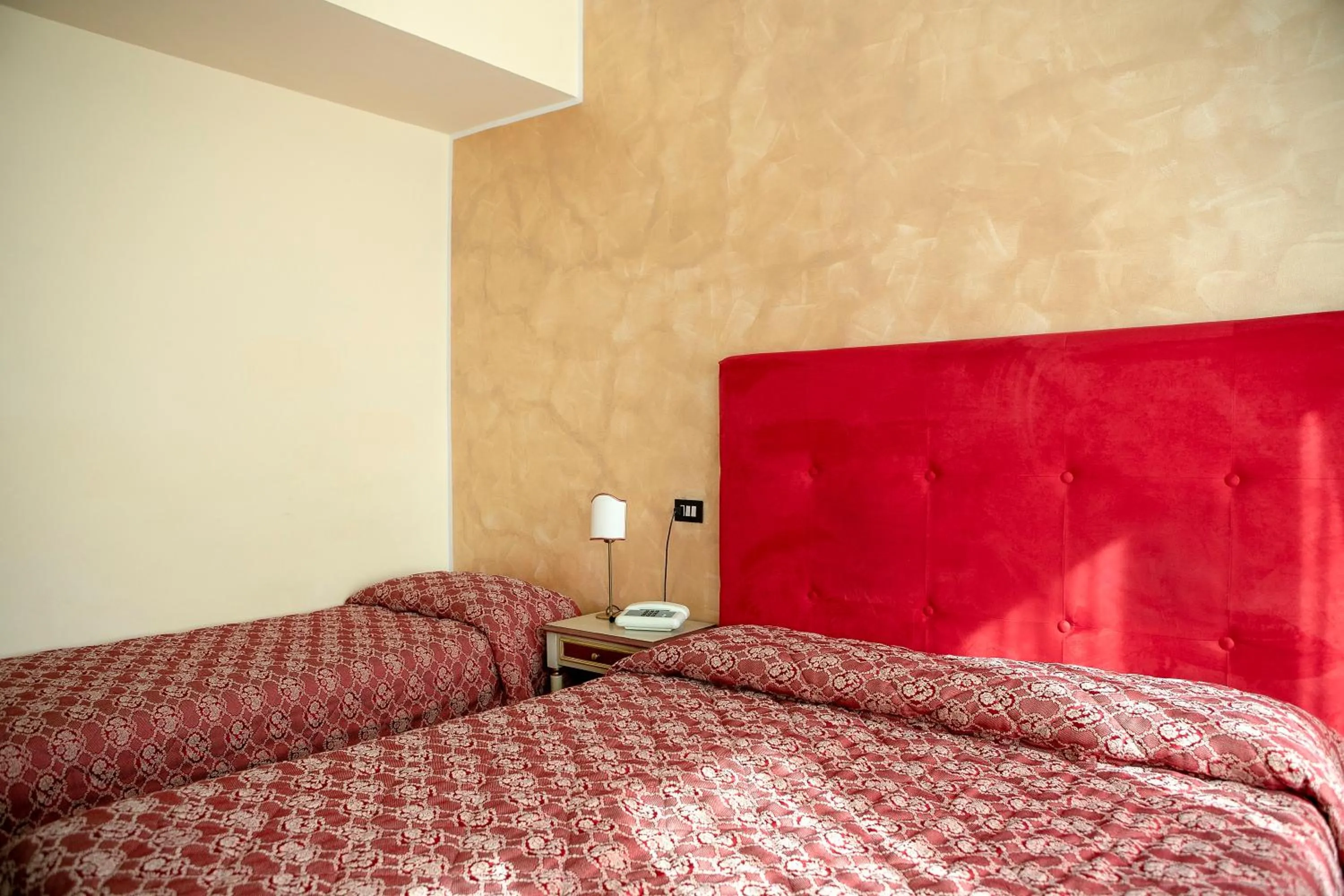 Bed in Hotel Fiordigigli