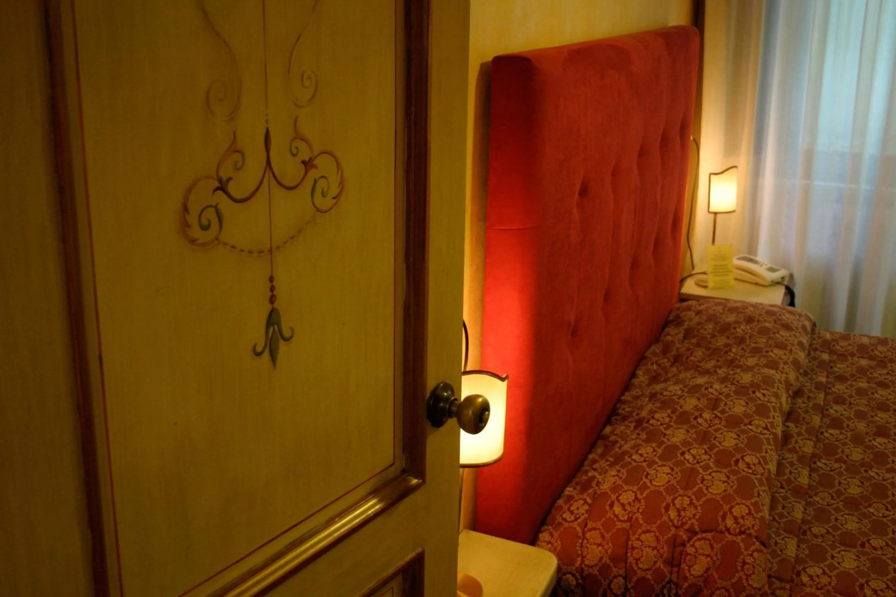 Decorative detail, Bed in Hotel Fiordigigli