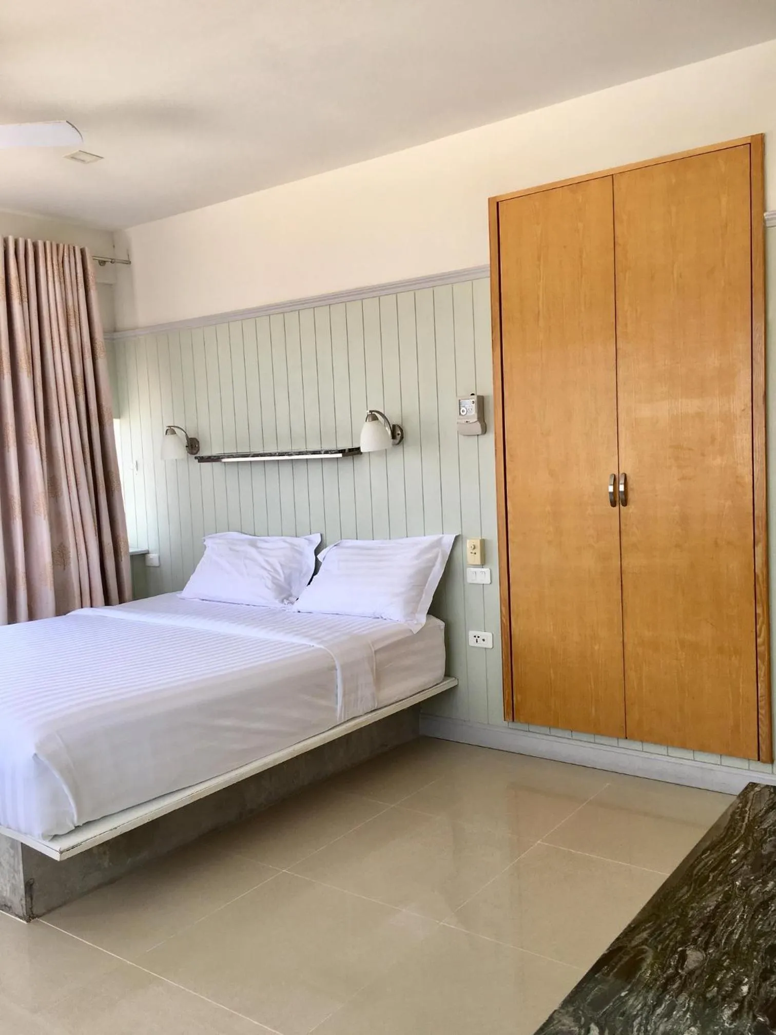 Bed in PierView Rooms