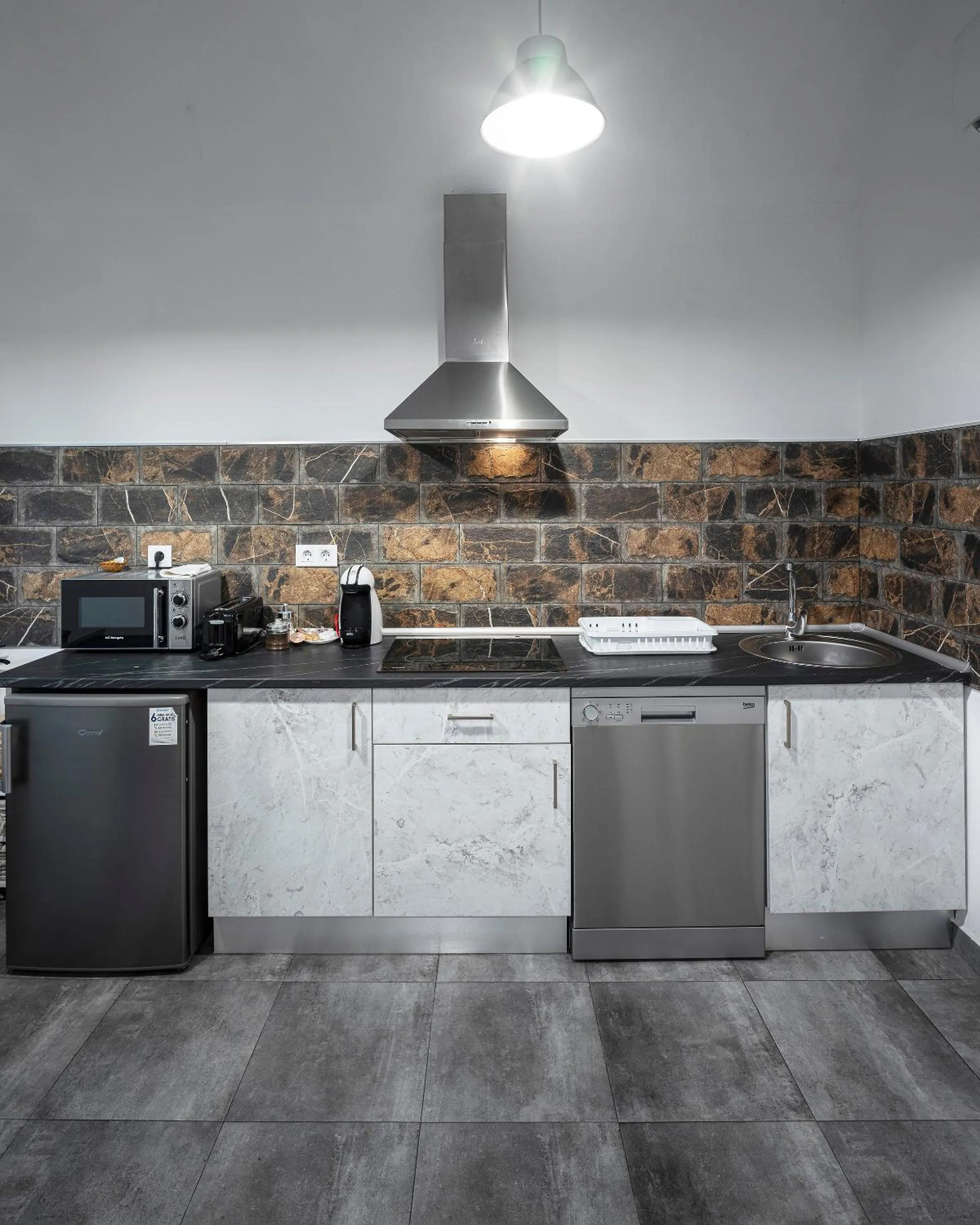 Kitchen or kitchenette in Apartamentos Gladiador