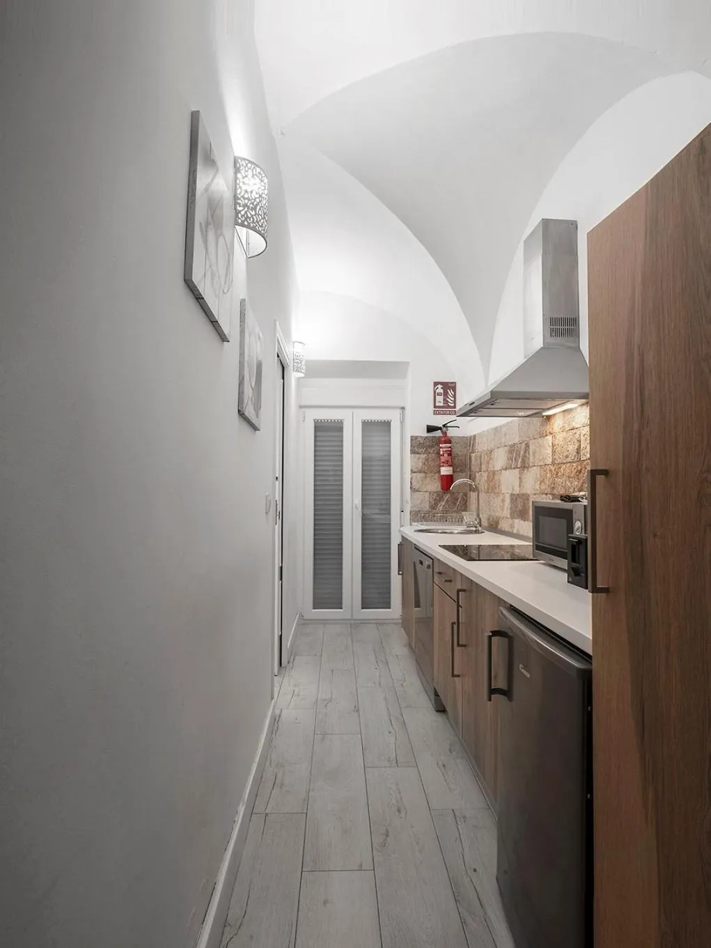 Kitchen or kitchenette in Apartamentos Gladiador