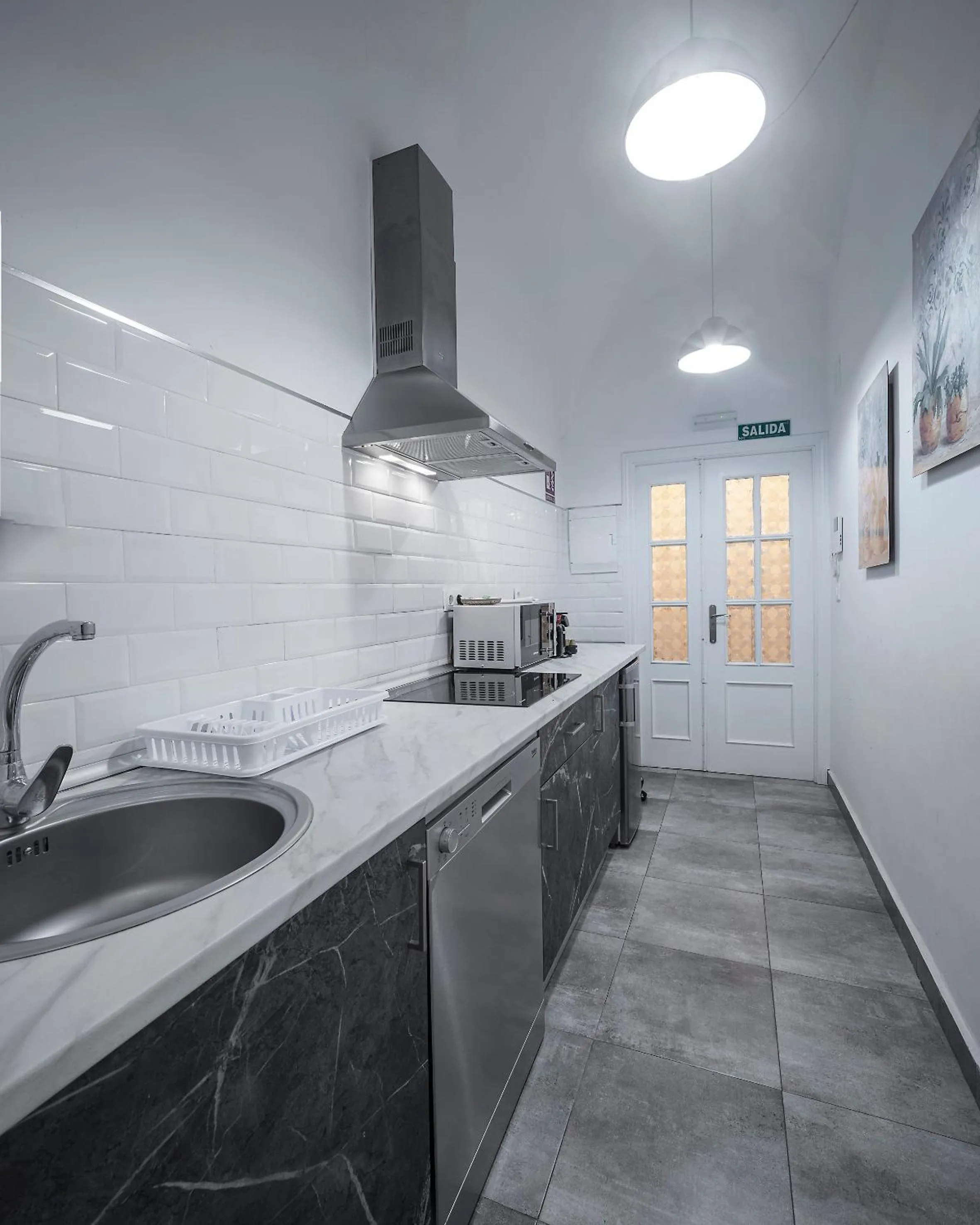 Kitchen or kitchenette in Apartamentos Gladiador