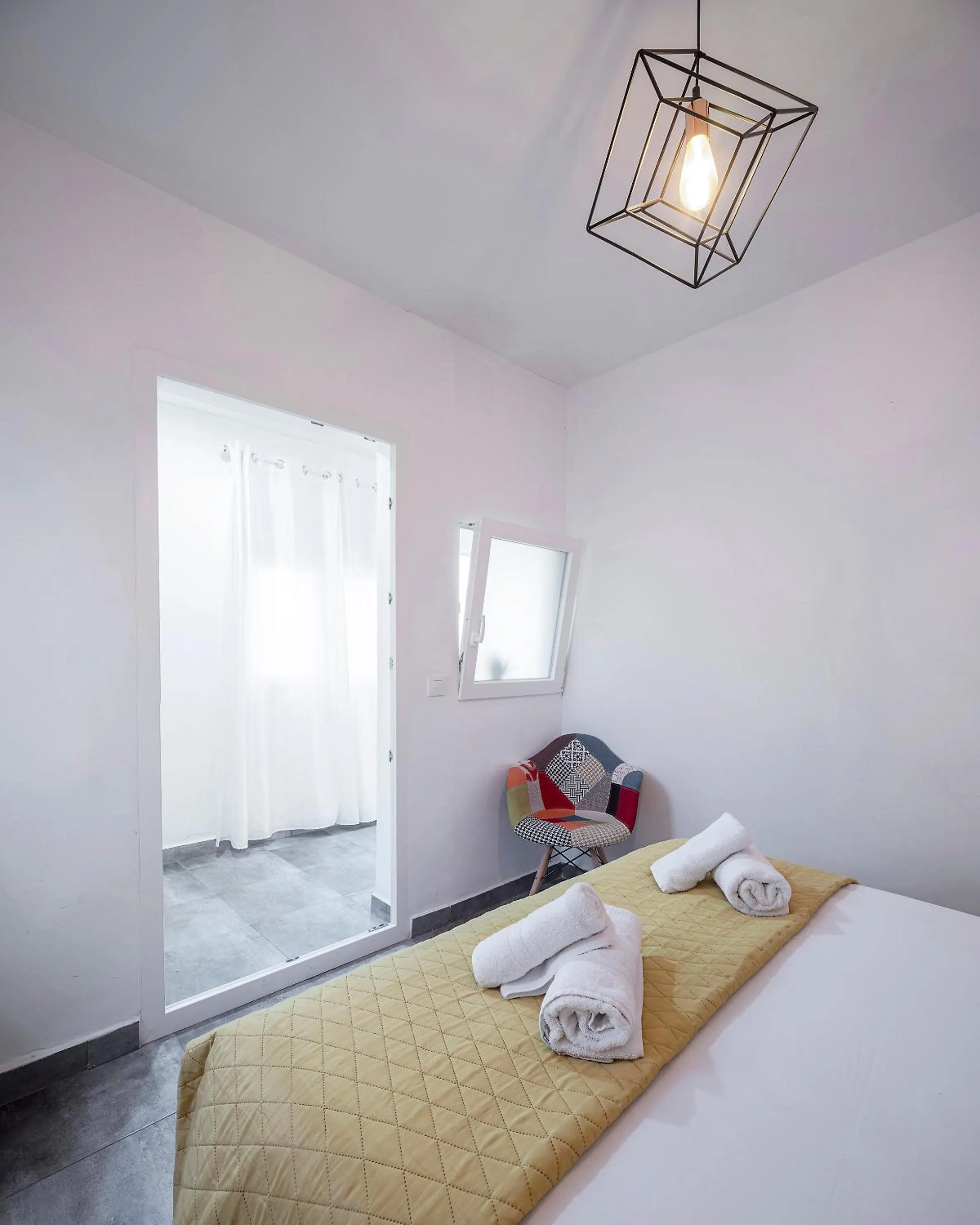 Bed in Apartamentos Gladiador