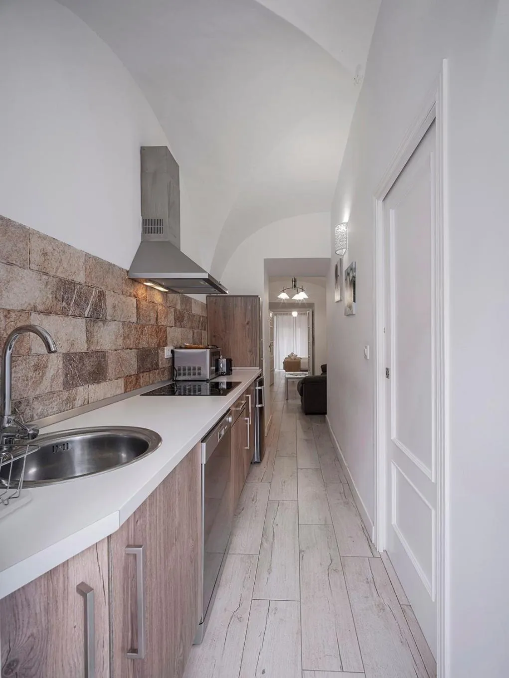 Kitchen or kitchenette in Apartamentos Gladiador