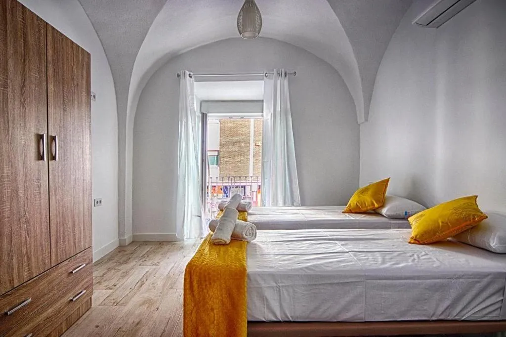 Photo of the whole room, Bed in Apartamentos Gladiador