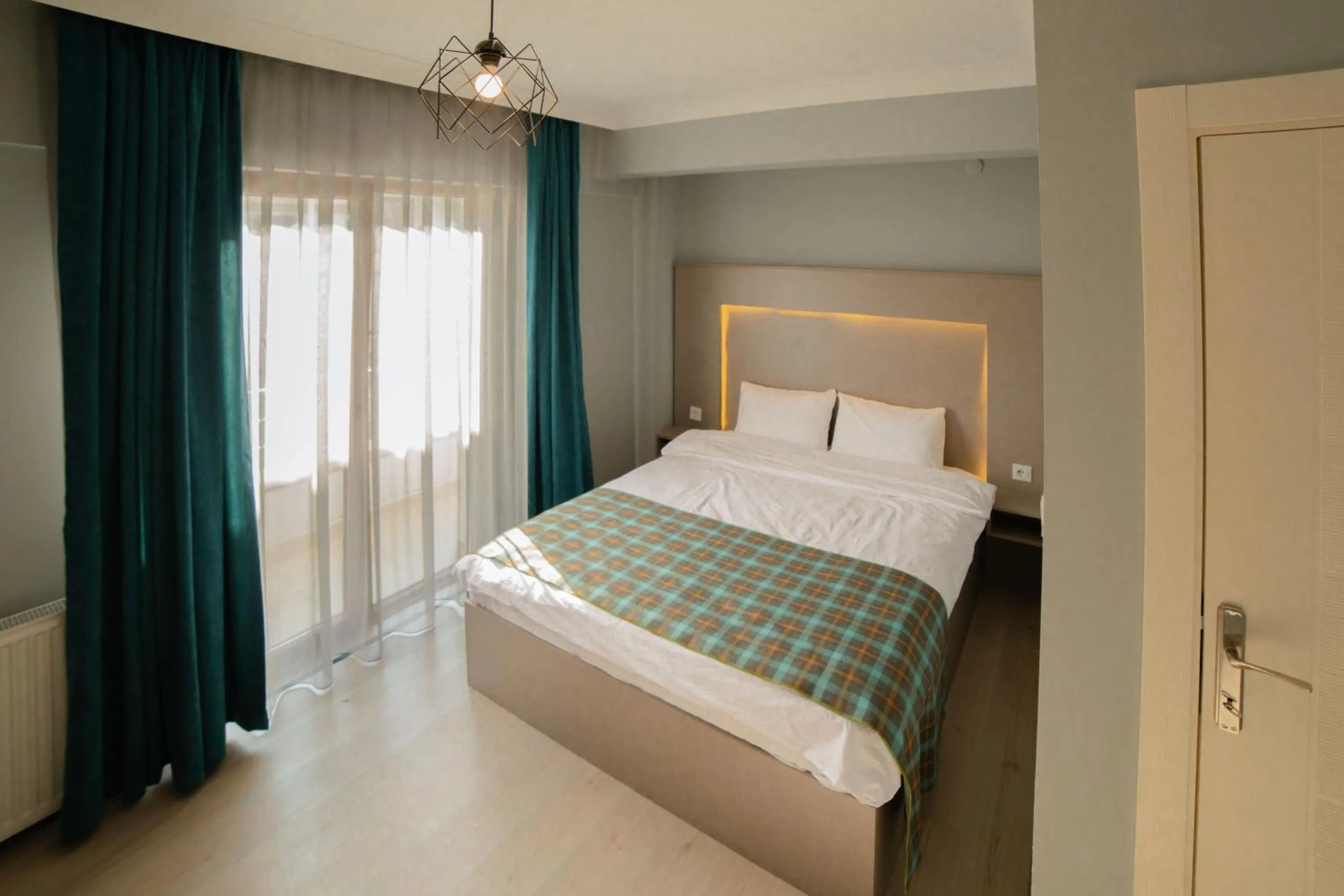 Bed in OTTO LOFT Premium Apartments