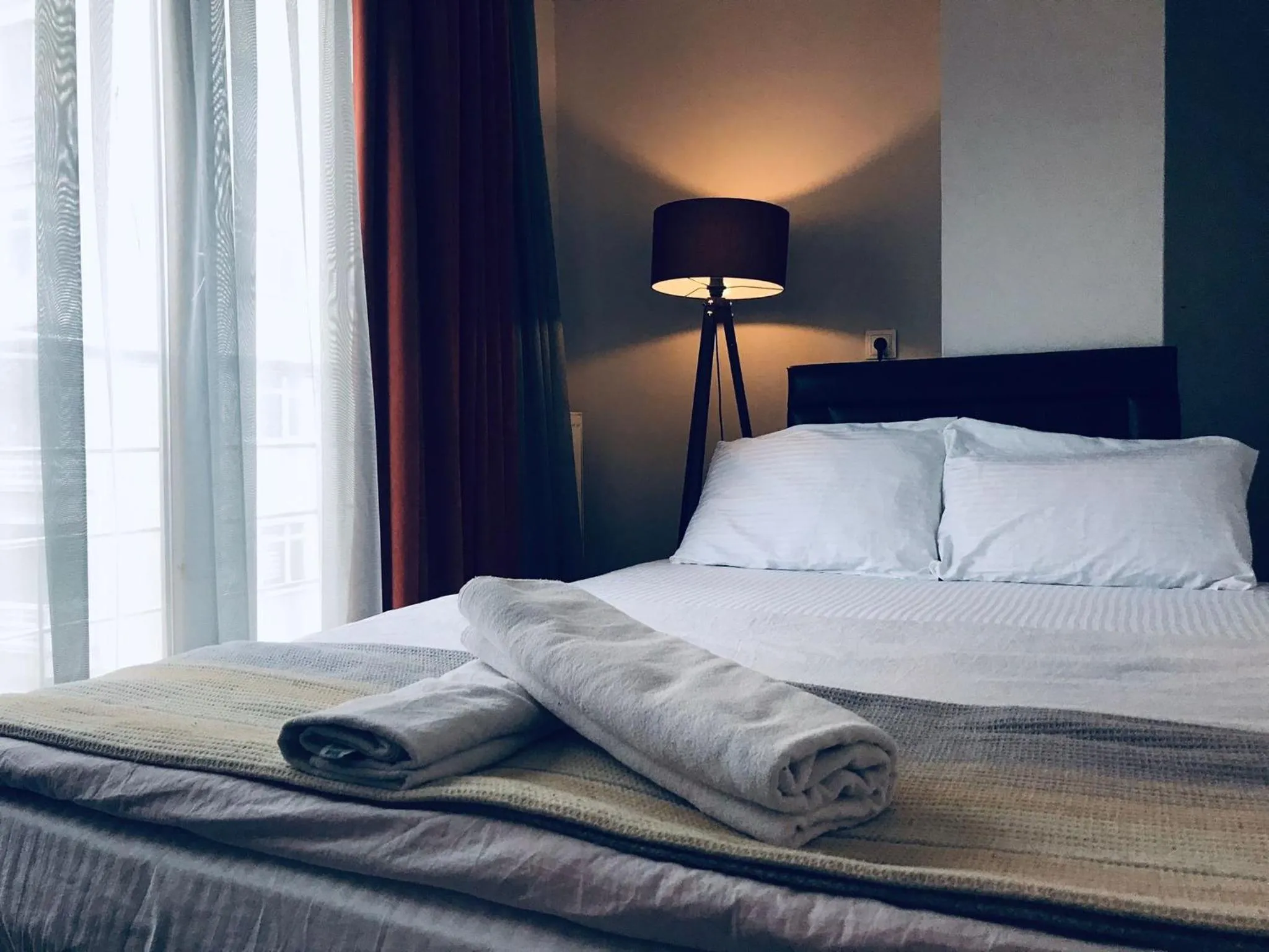 Bed in OTTO LOFT Premium Apartments