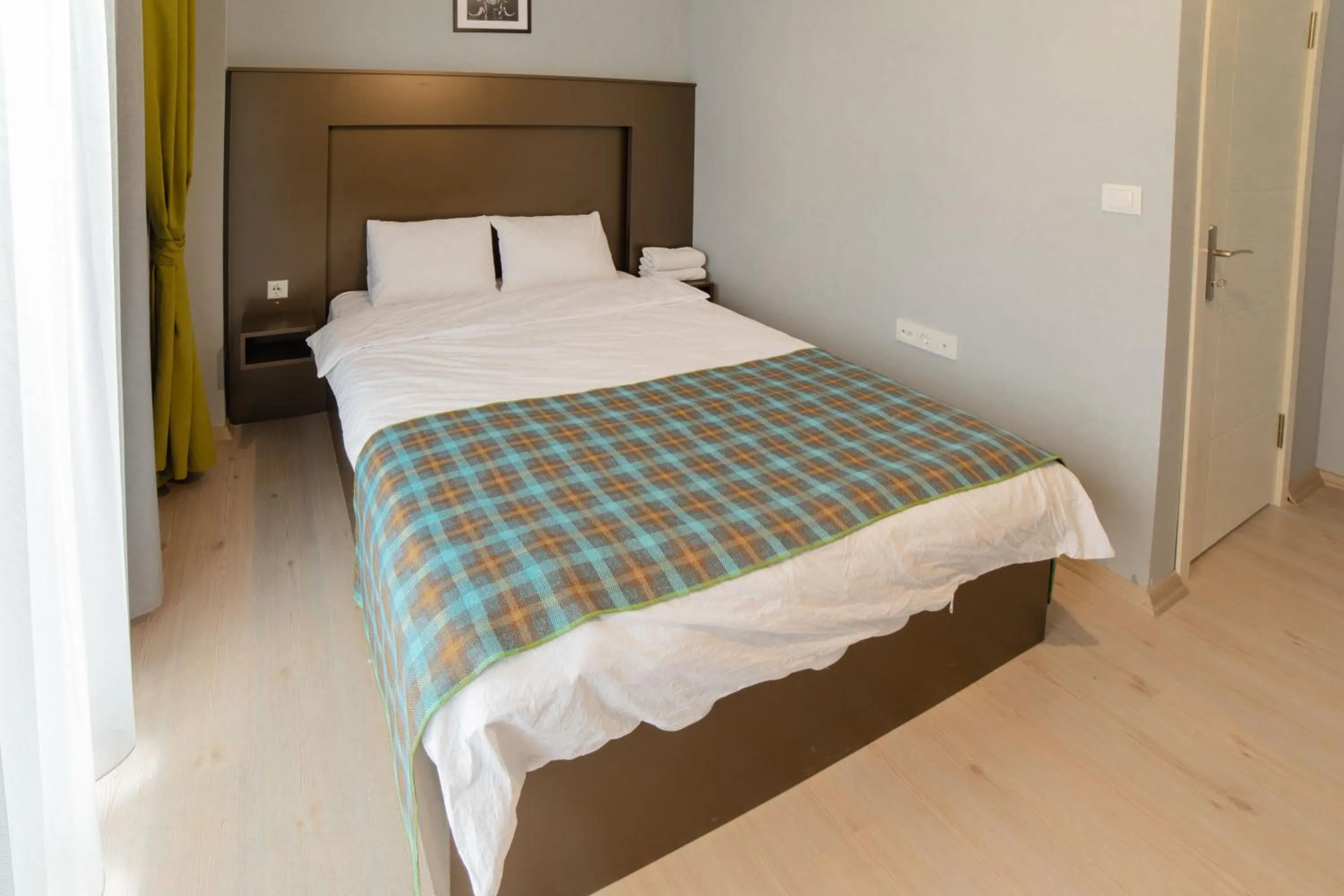 Bed in OTTO LOFT Premium Apartments