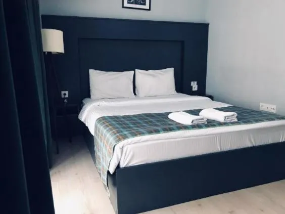 Bed in OTTO LOFT Premium Apartments