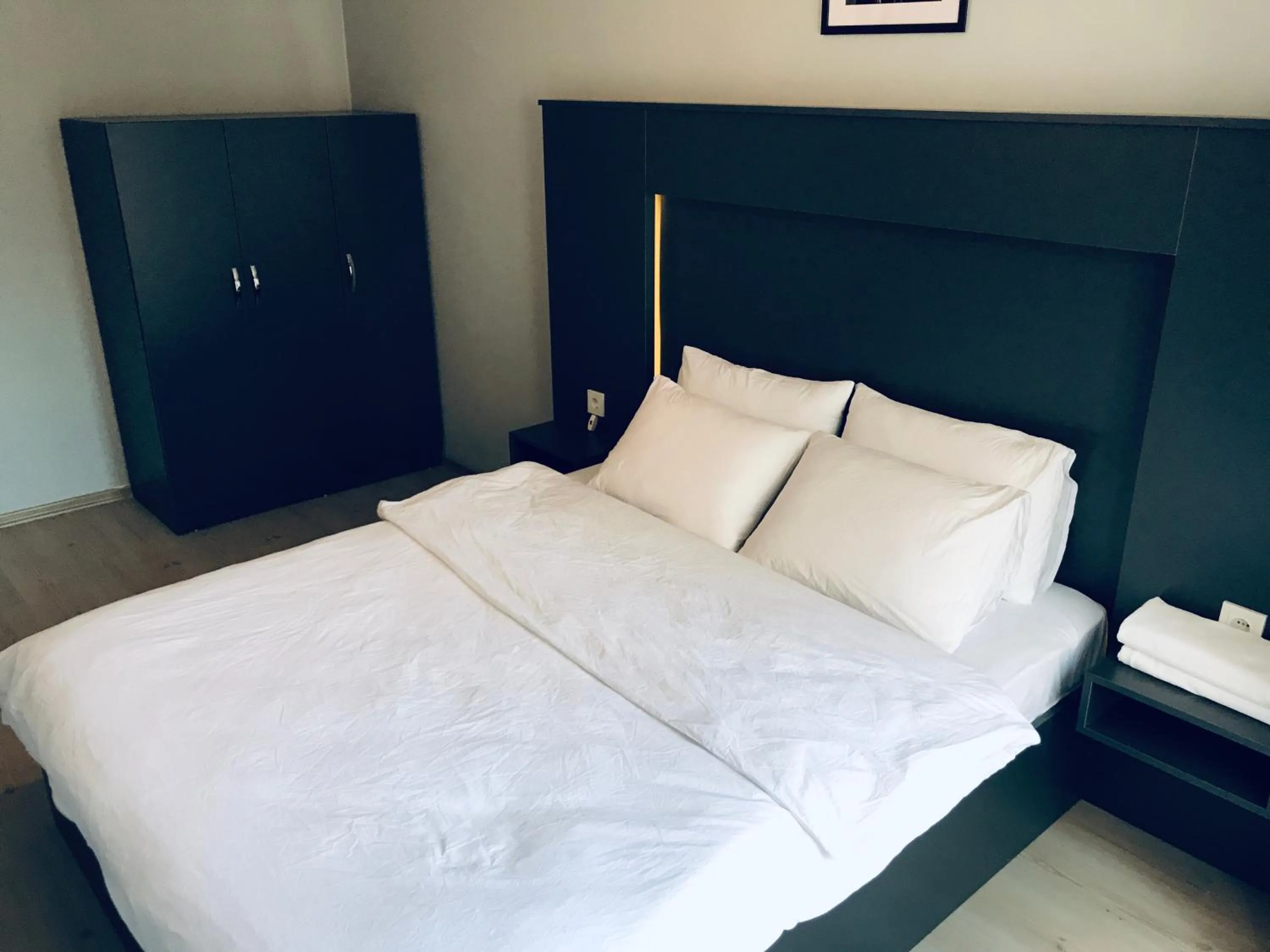 Bed in OTTO LOFT Premium Apartments