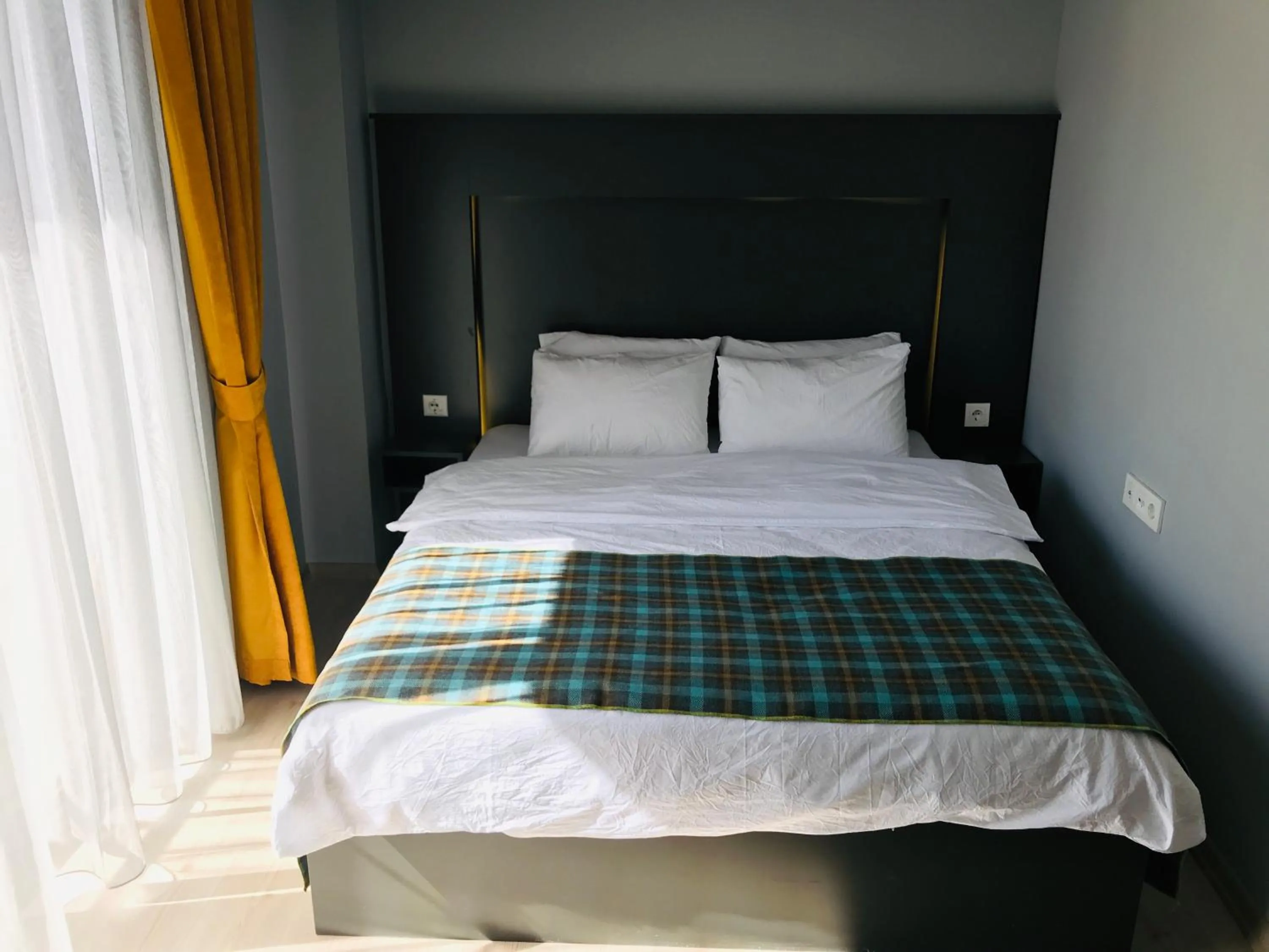 Bed in OTTO LOFT Premium Apartments