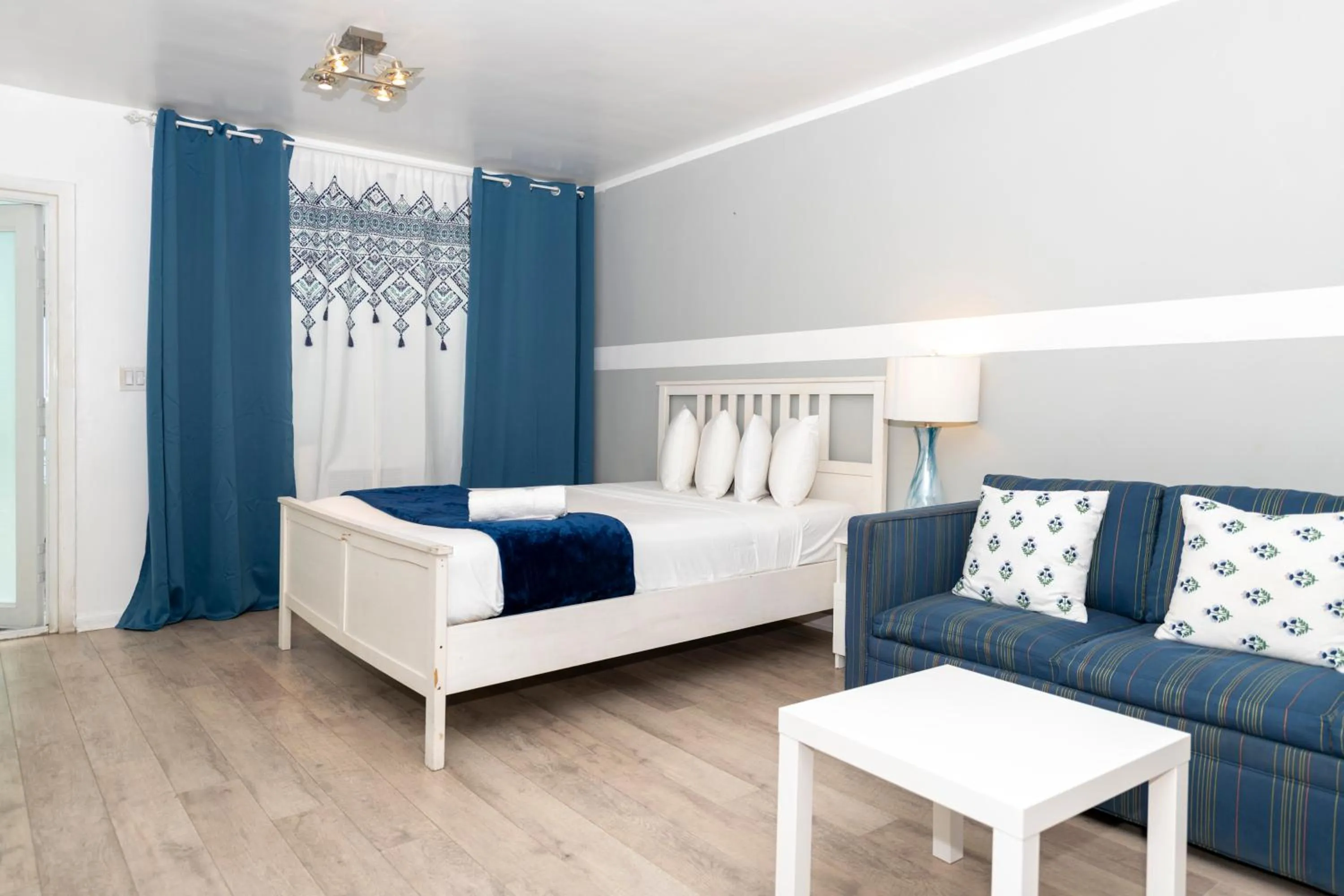 Bed in Sofi Beach Apartments