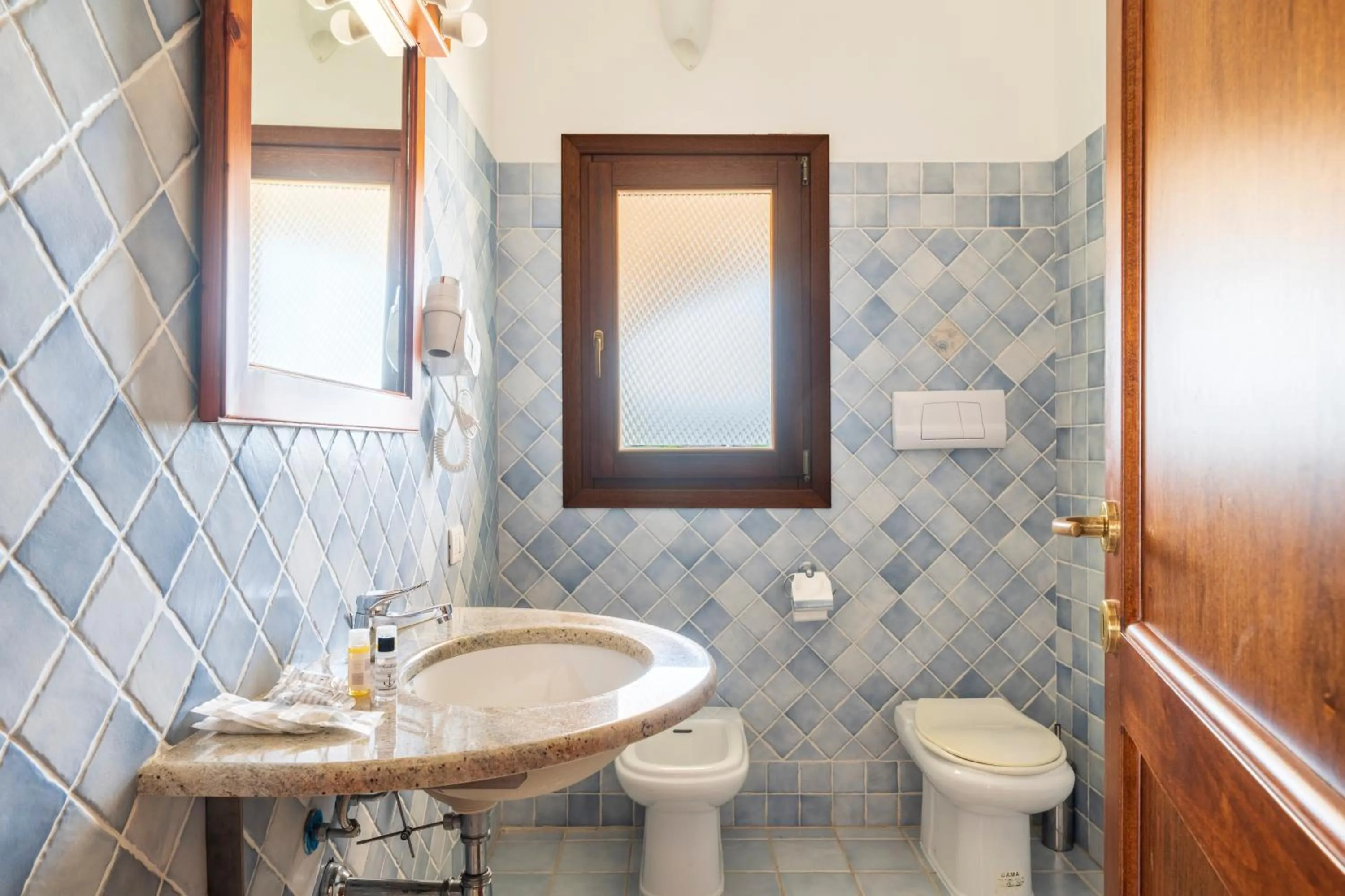 Bathroom in Residence Baia Santa Reparata