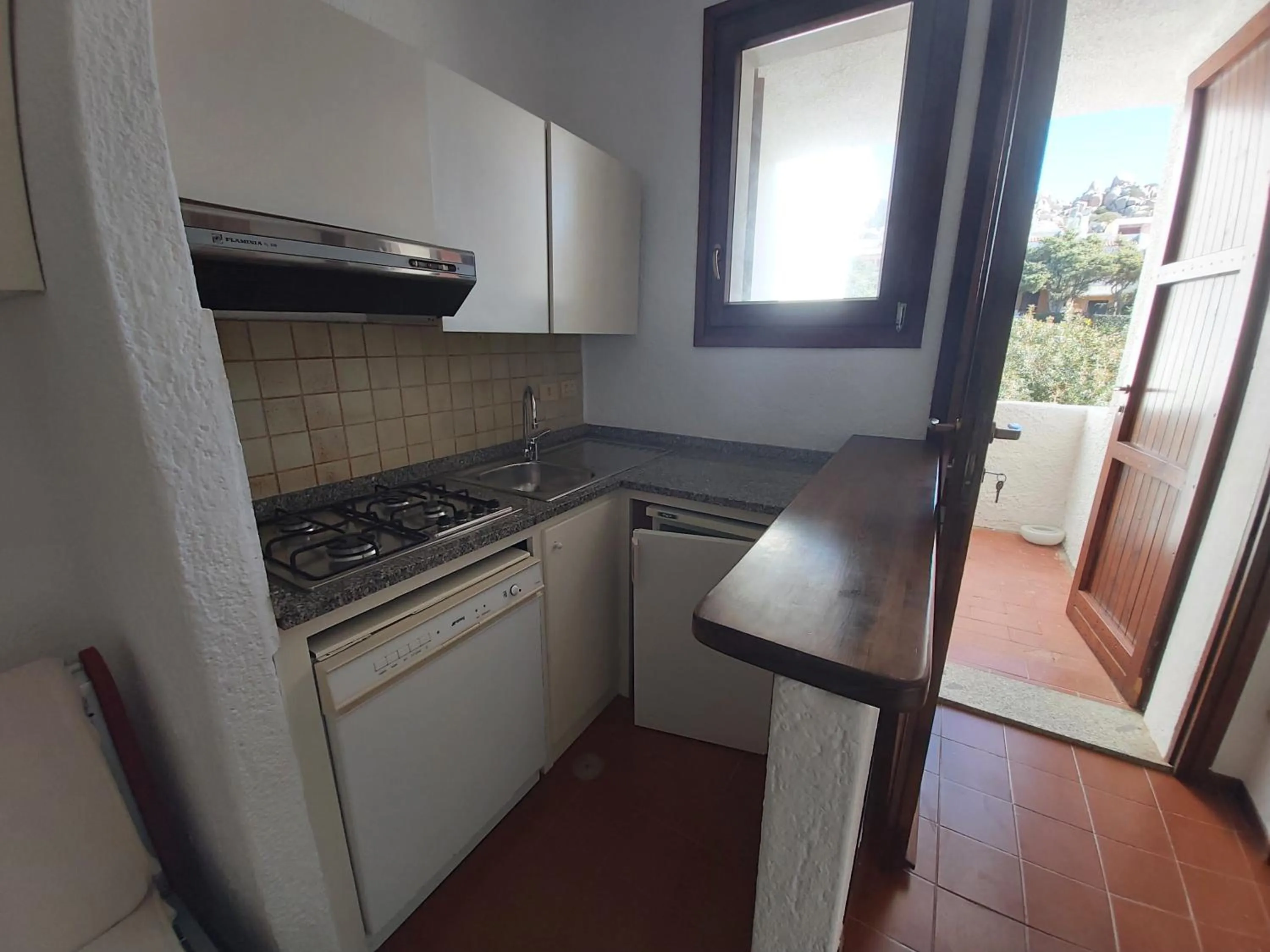 Kitchen or kitchenette in Residence Baia Santa Reparata