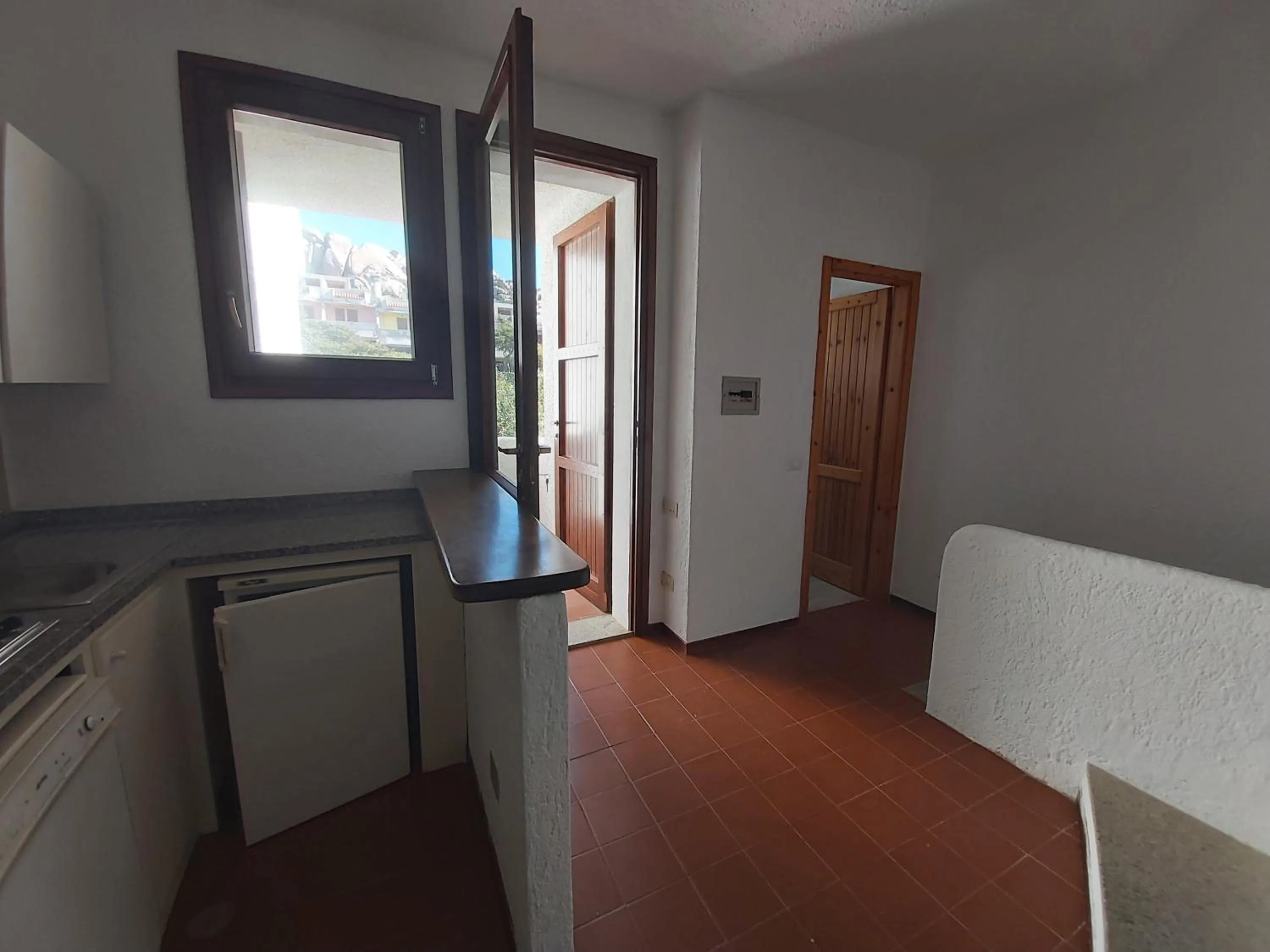 Kitchen or kitchenette in Residence Baia Santa Reparata