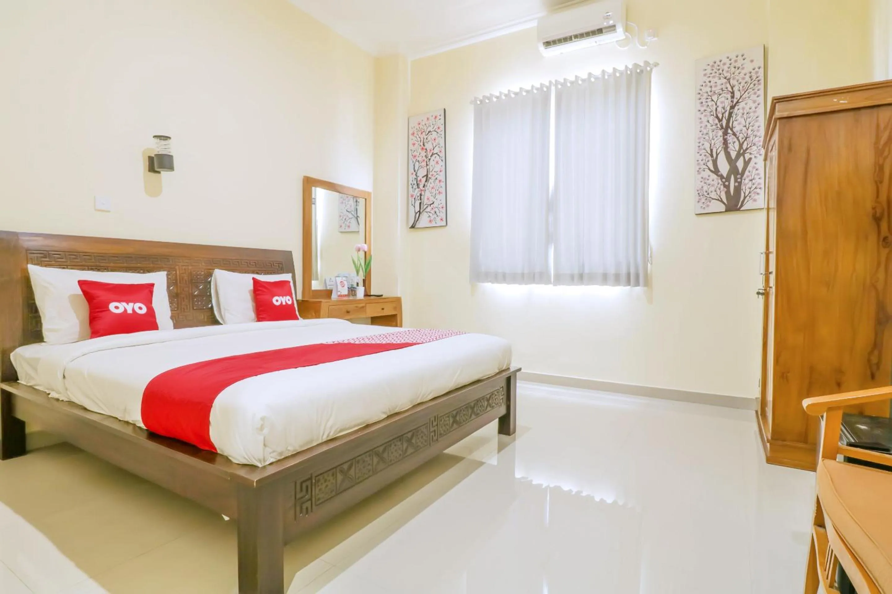 Bedroom in OYO 1684 Marina Suite Apartment Bali