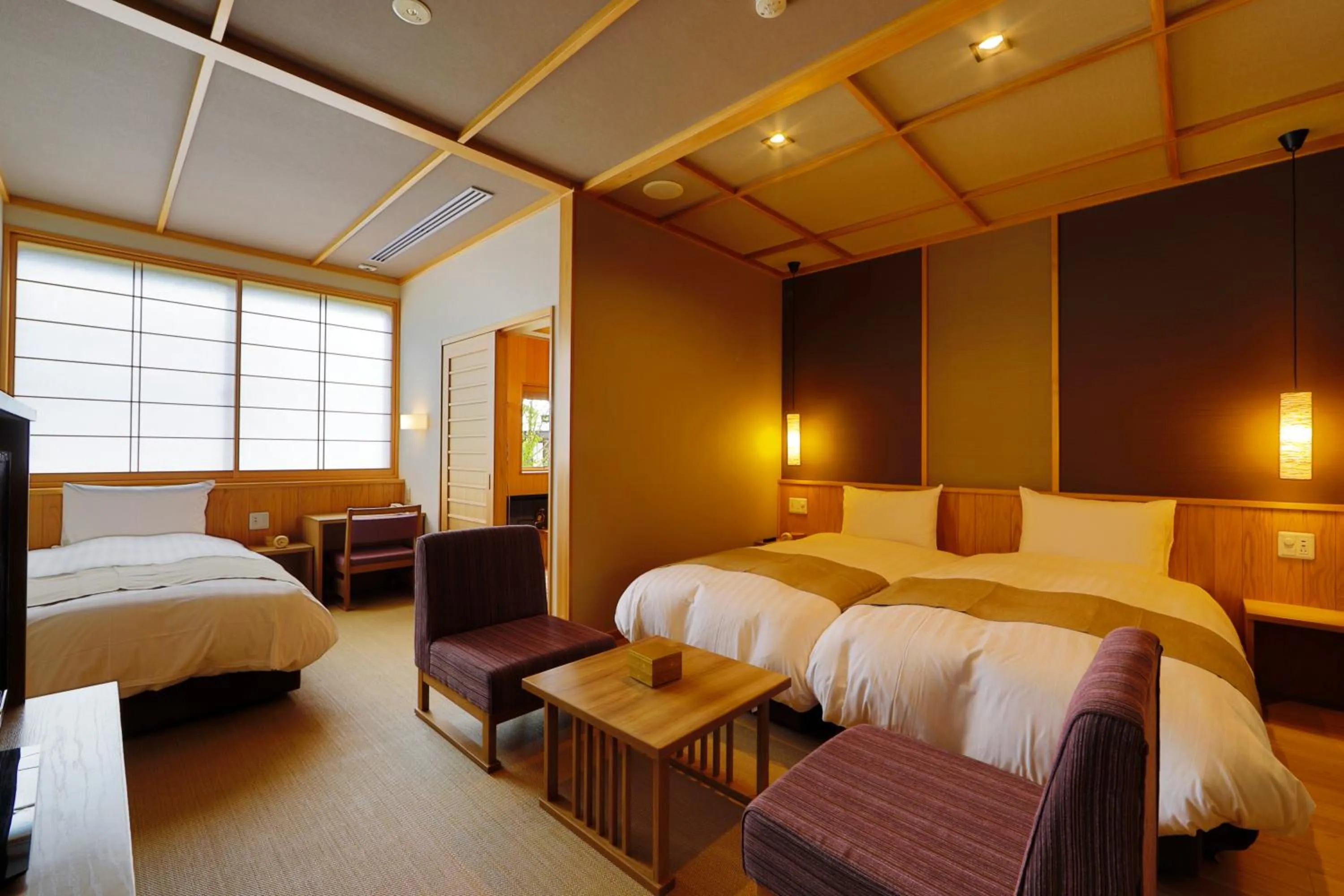 Bed in Yukemuri no Yado Inazumi Onsen