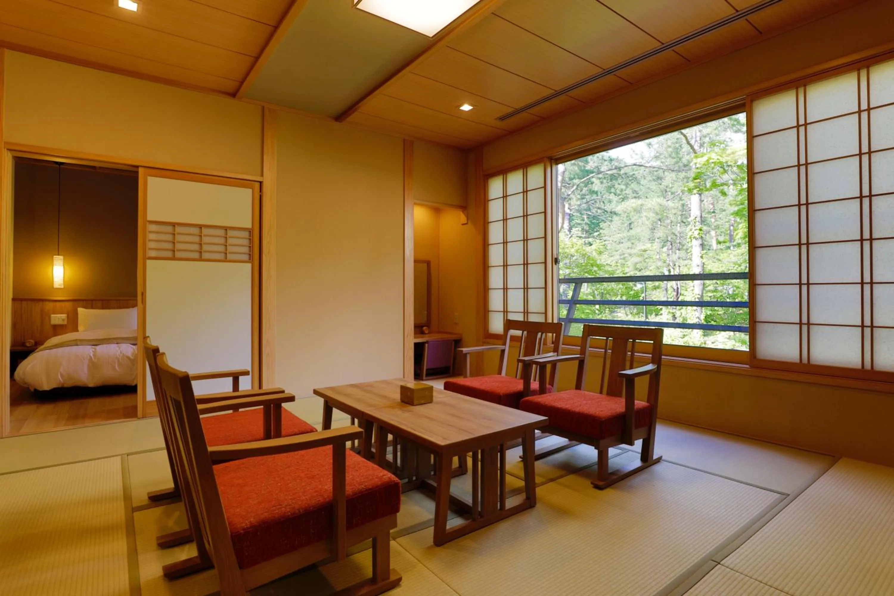 View (from property/room), Bed in Yukemuri no Yado Inazumi Onsen