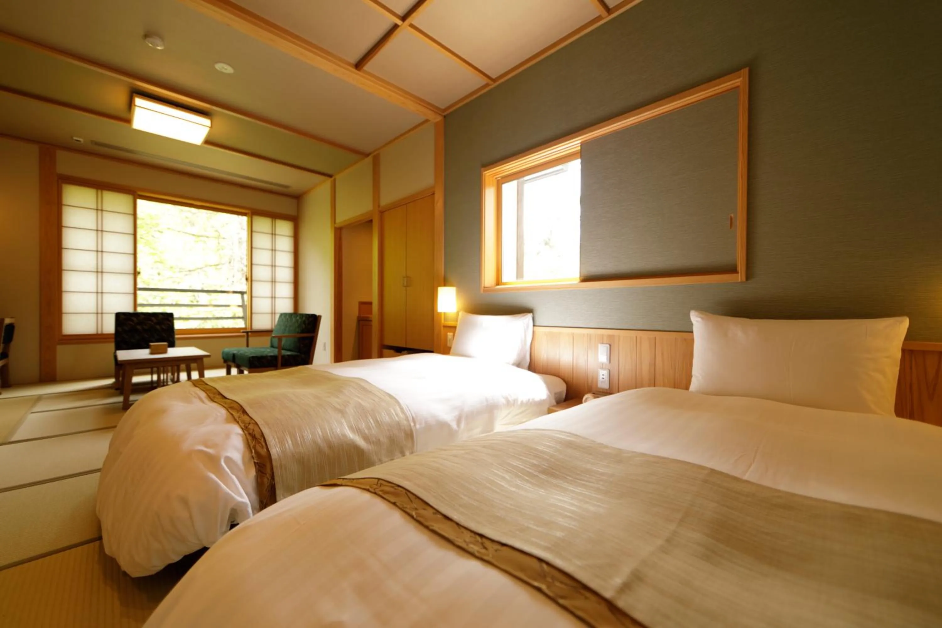 Photo of the whole room, Bed in Yukemuri no Yado Inazumi Onsen