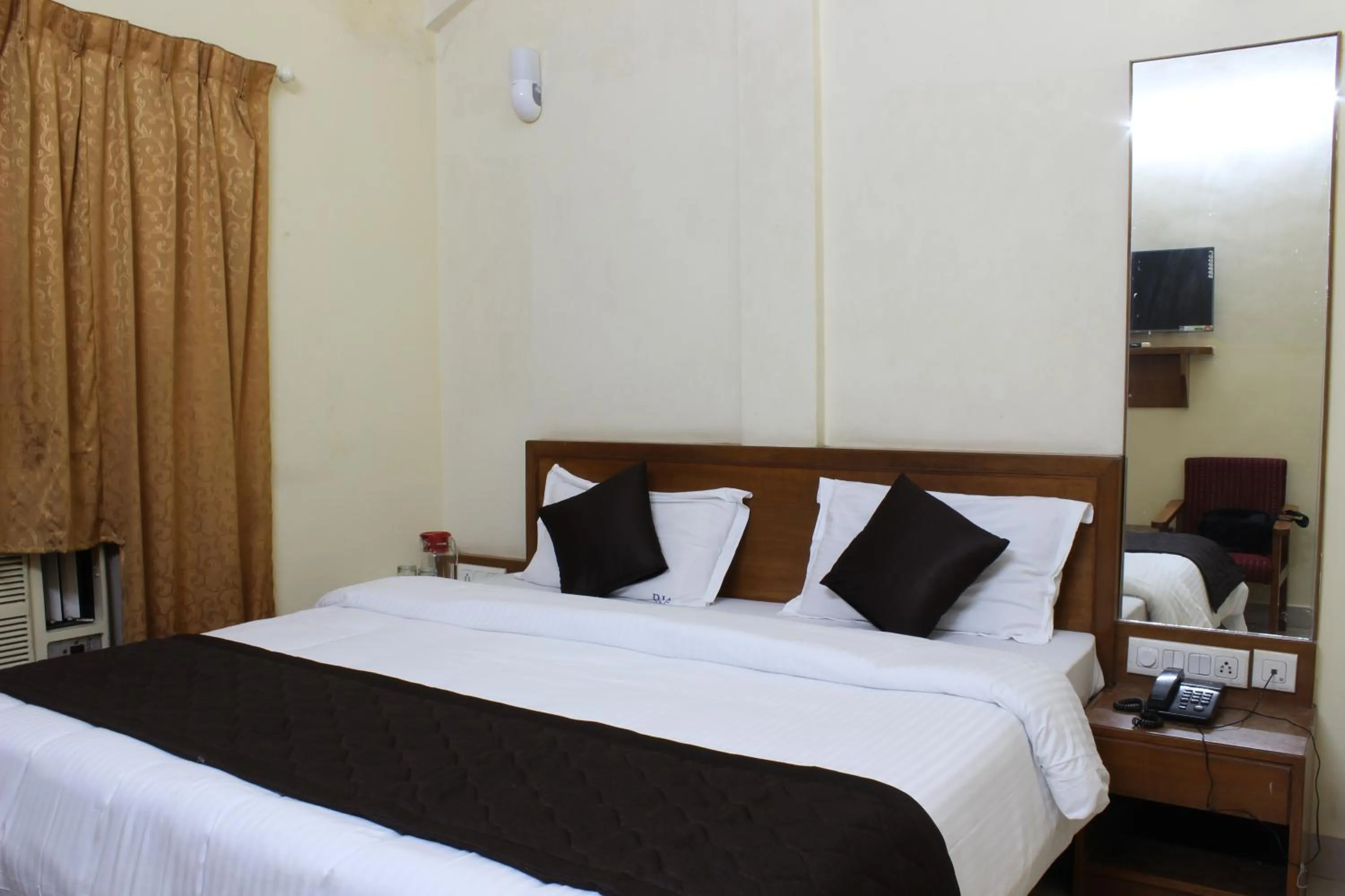 Bed in Ria Residency