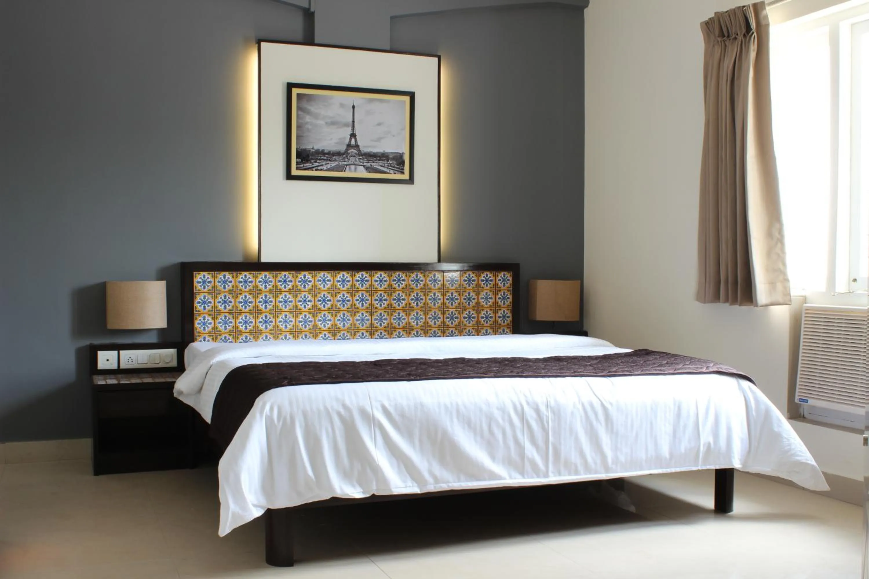 Bed in Ria Residency