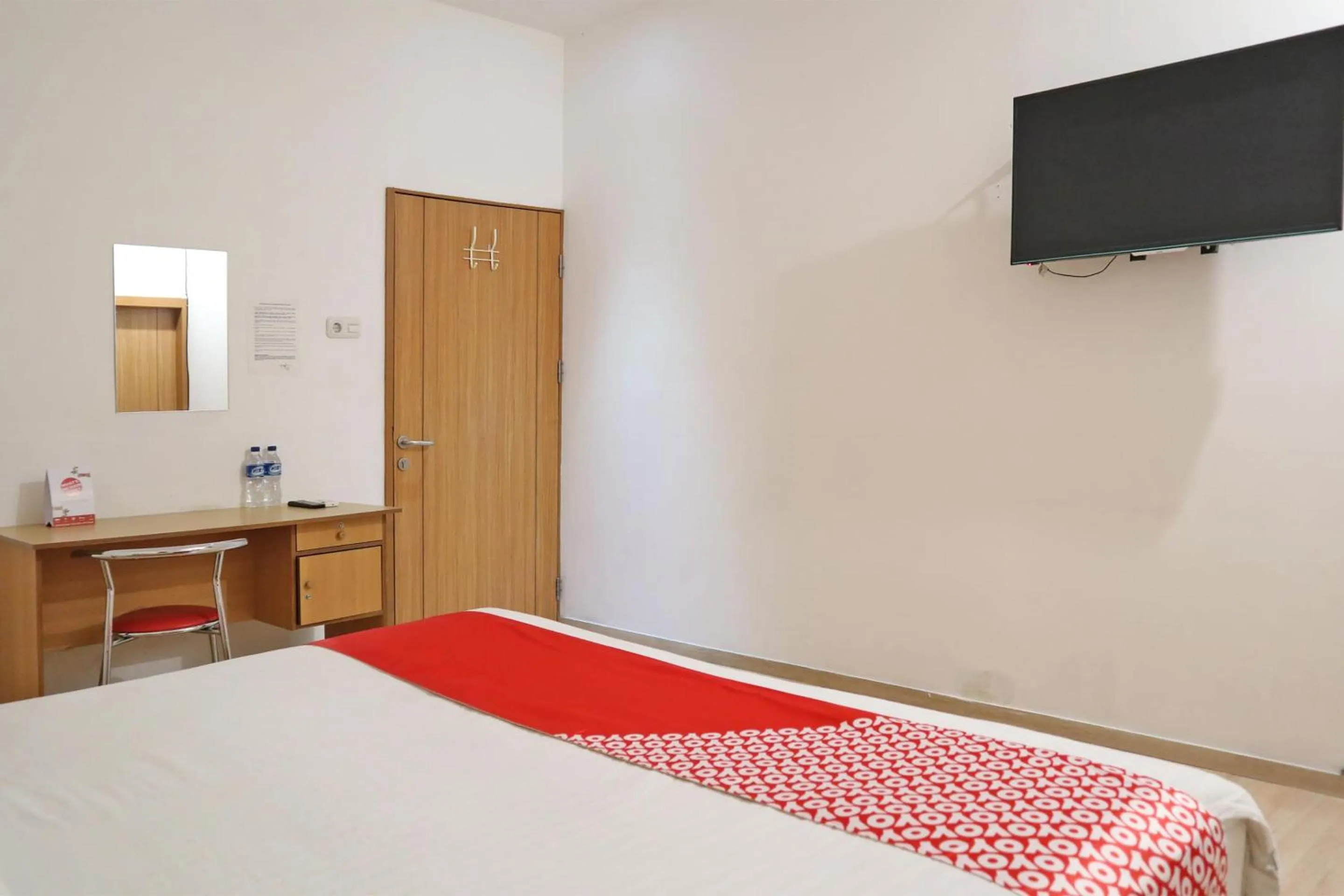 Bedroom, Bed in Hotel O M Authentic Kost Man