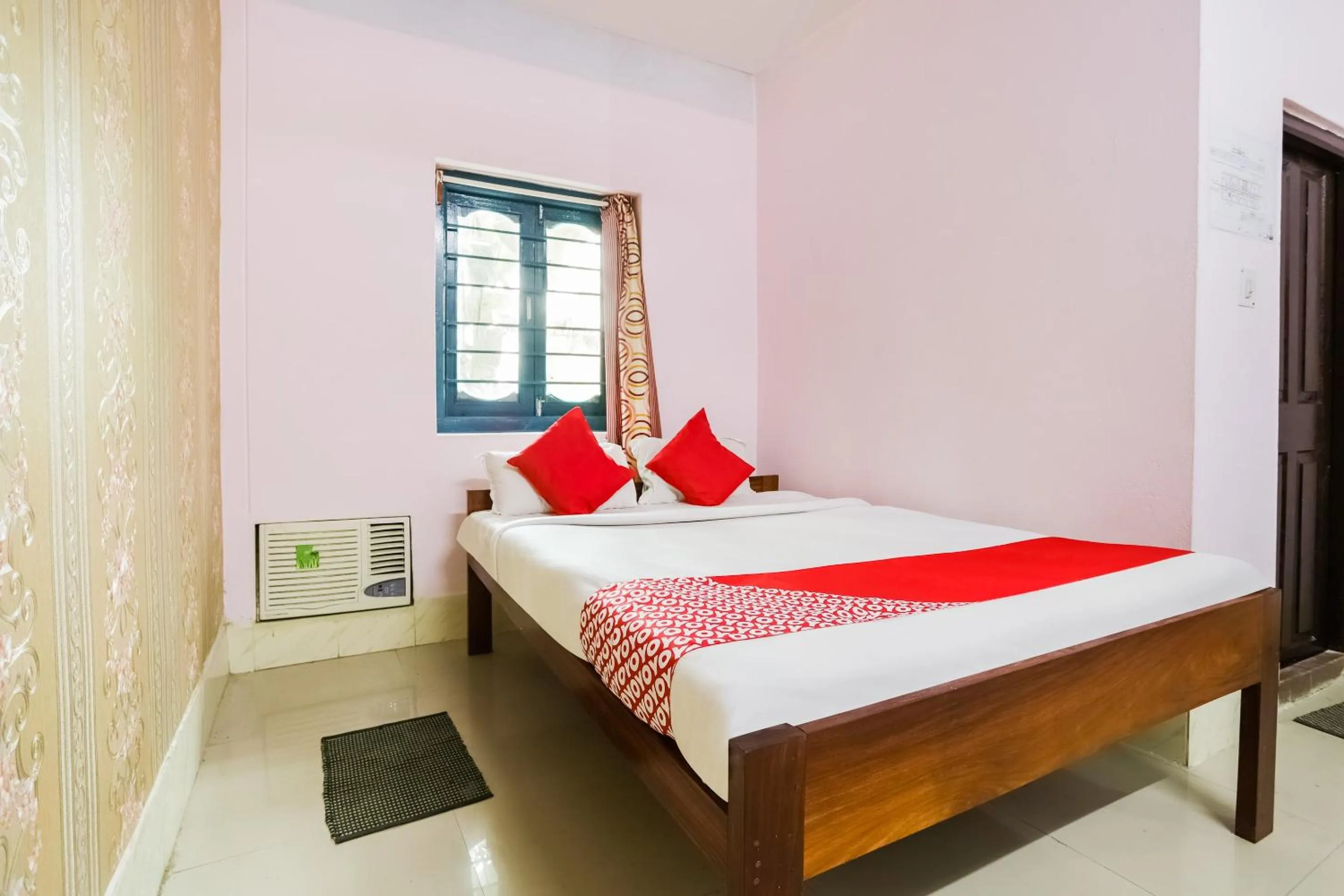 Bedroom in Hotel O Aashna