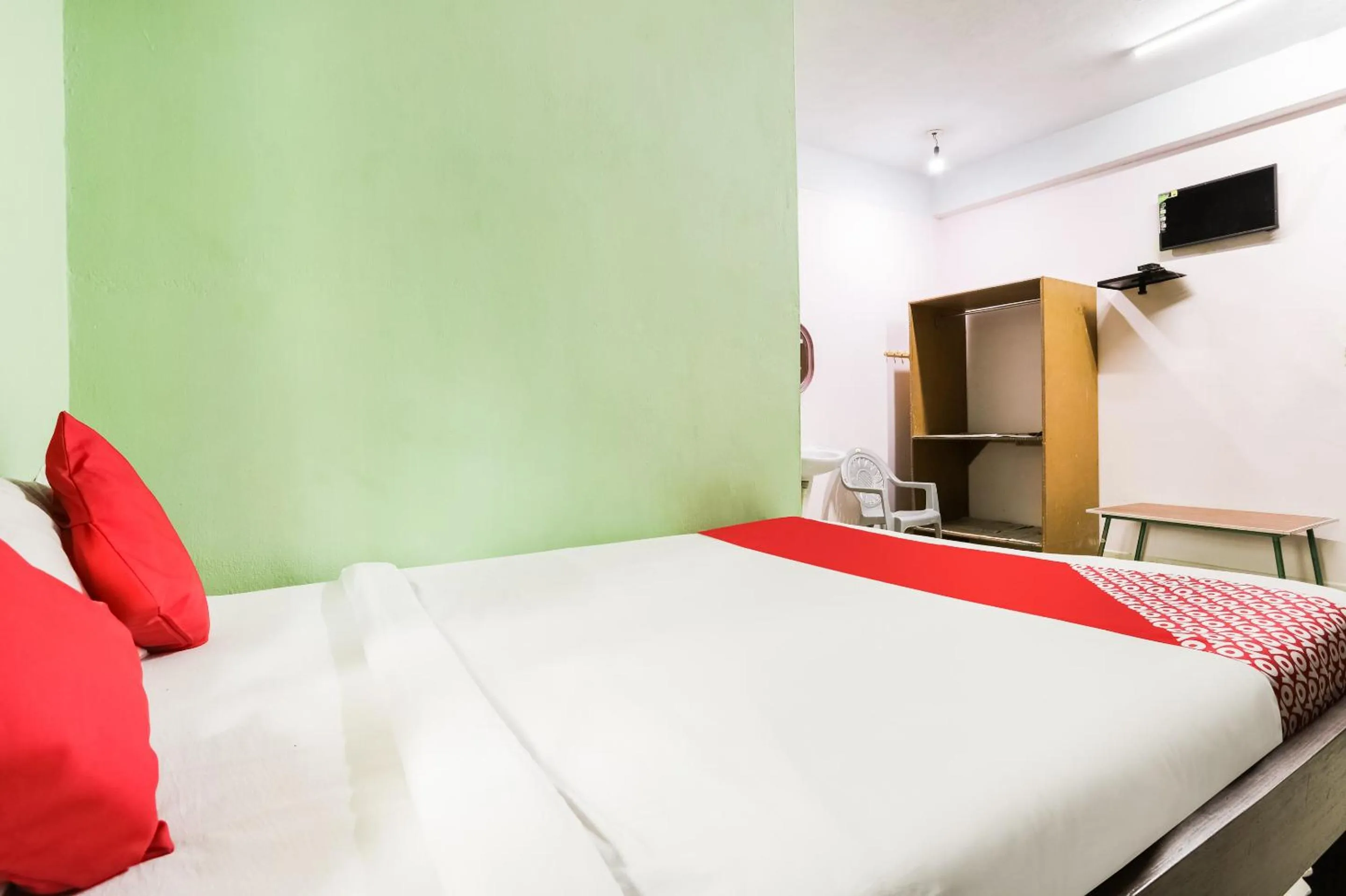 Bedroom in Hotel O Aashna