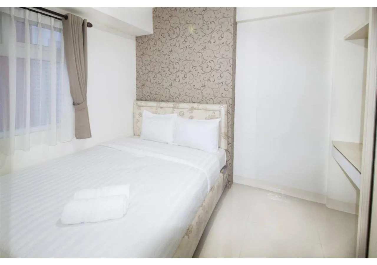 Bedroom in Apartment Green Pramuka by Vincent