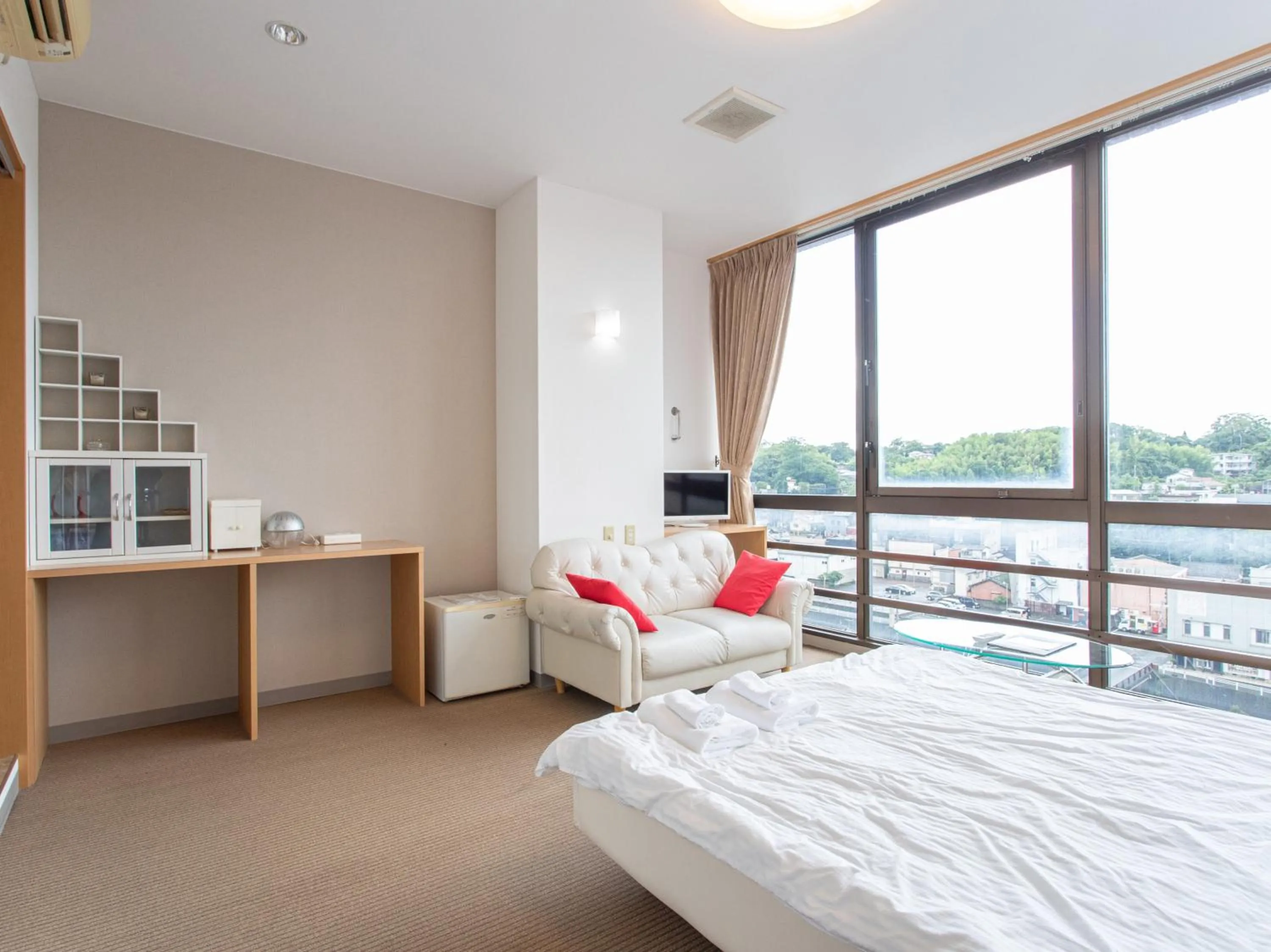 Photo of the whole room, Bed in Tabist New World Hotel Kagoshima Kanoya