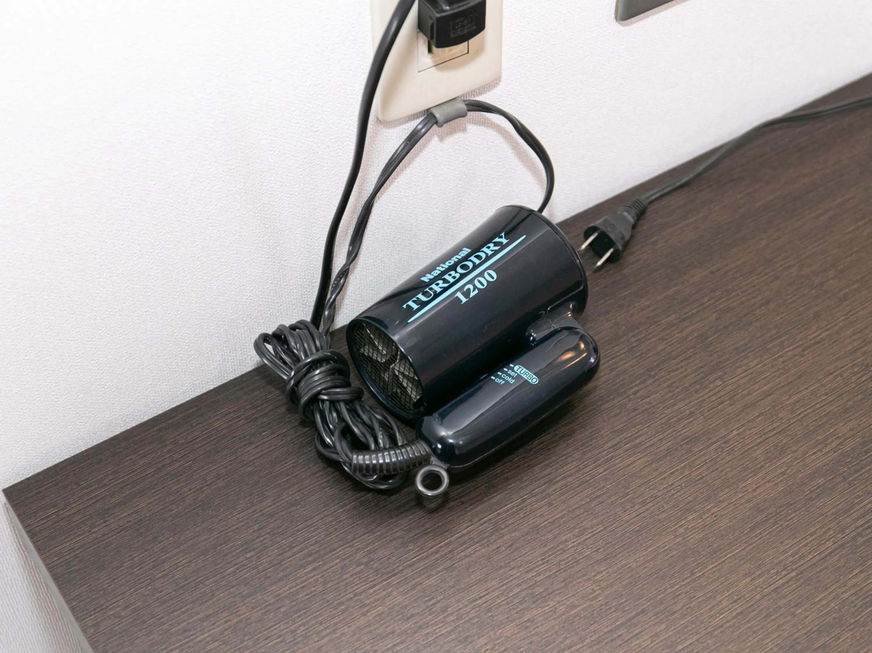 hair dryier in Tabist New World Hotel Kagoshima Kanoya