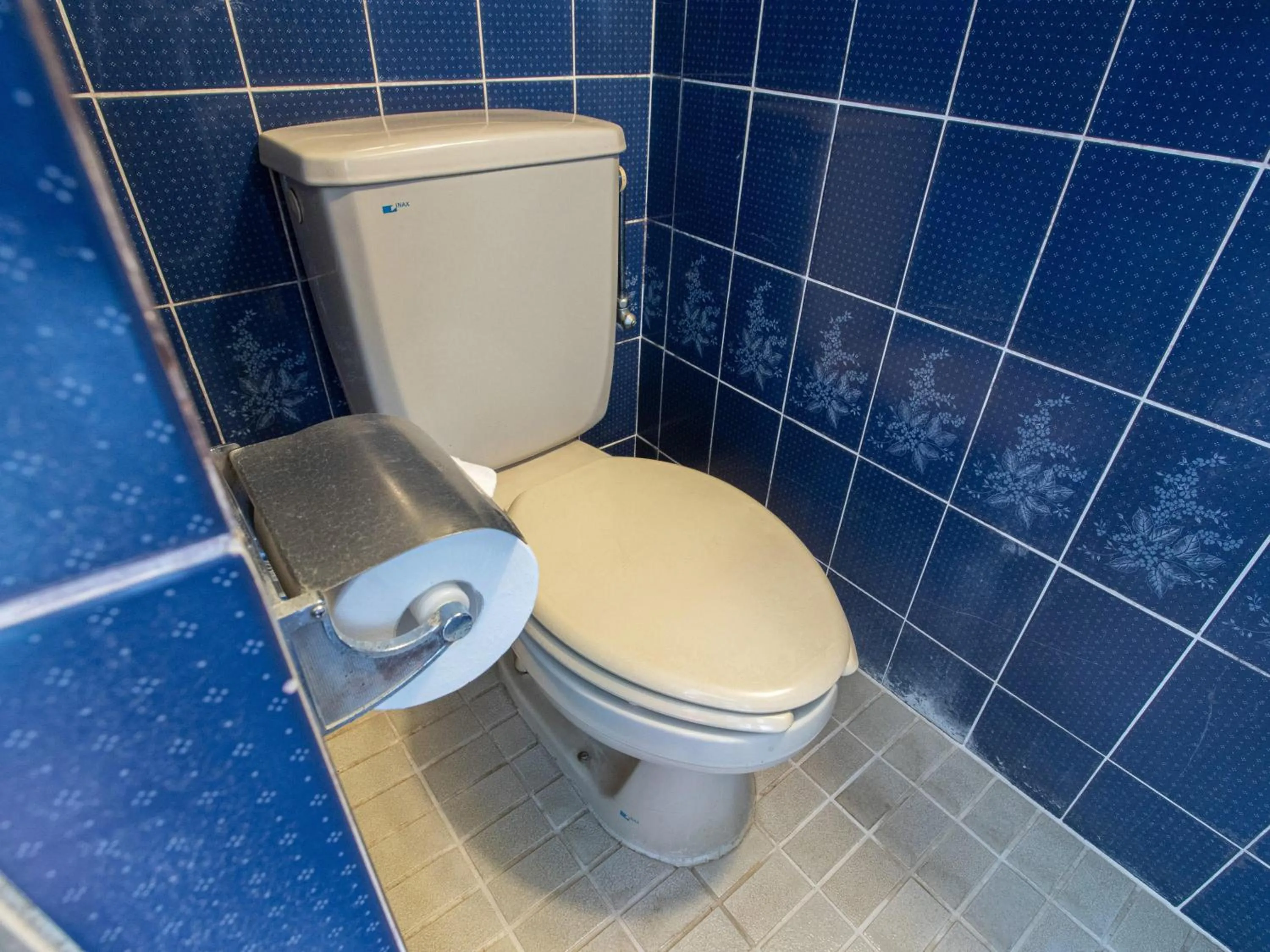 Toilet in Tabist New World Hotel Kagoshima Kanoya