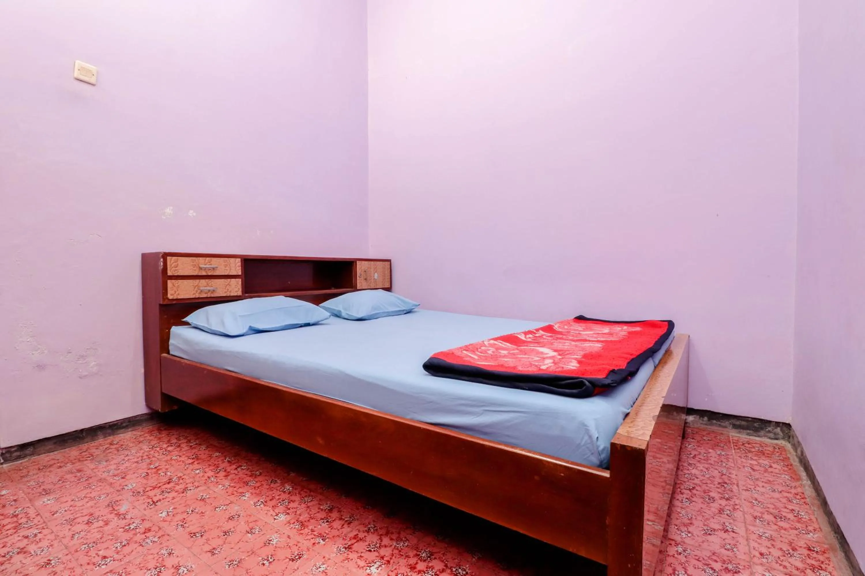 Bed in Penginapan Sedyo Rahayu