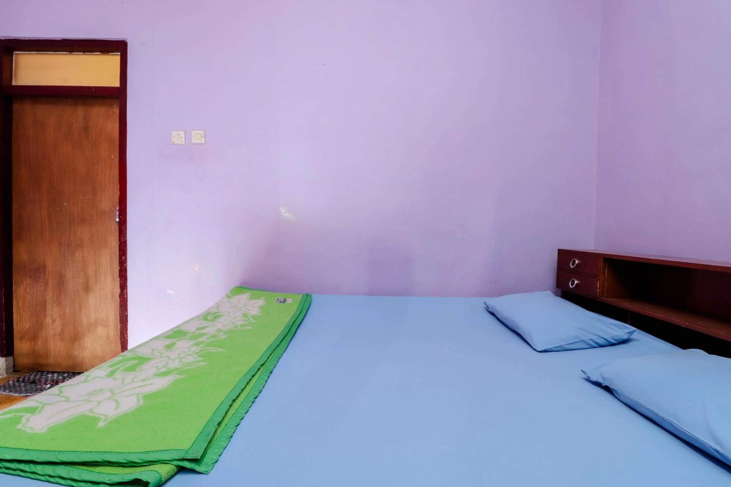 Bed in Penginapan Sedyo Rahayu