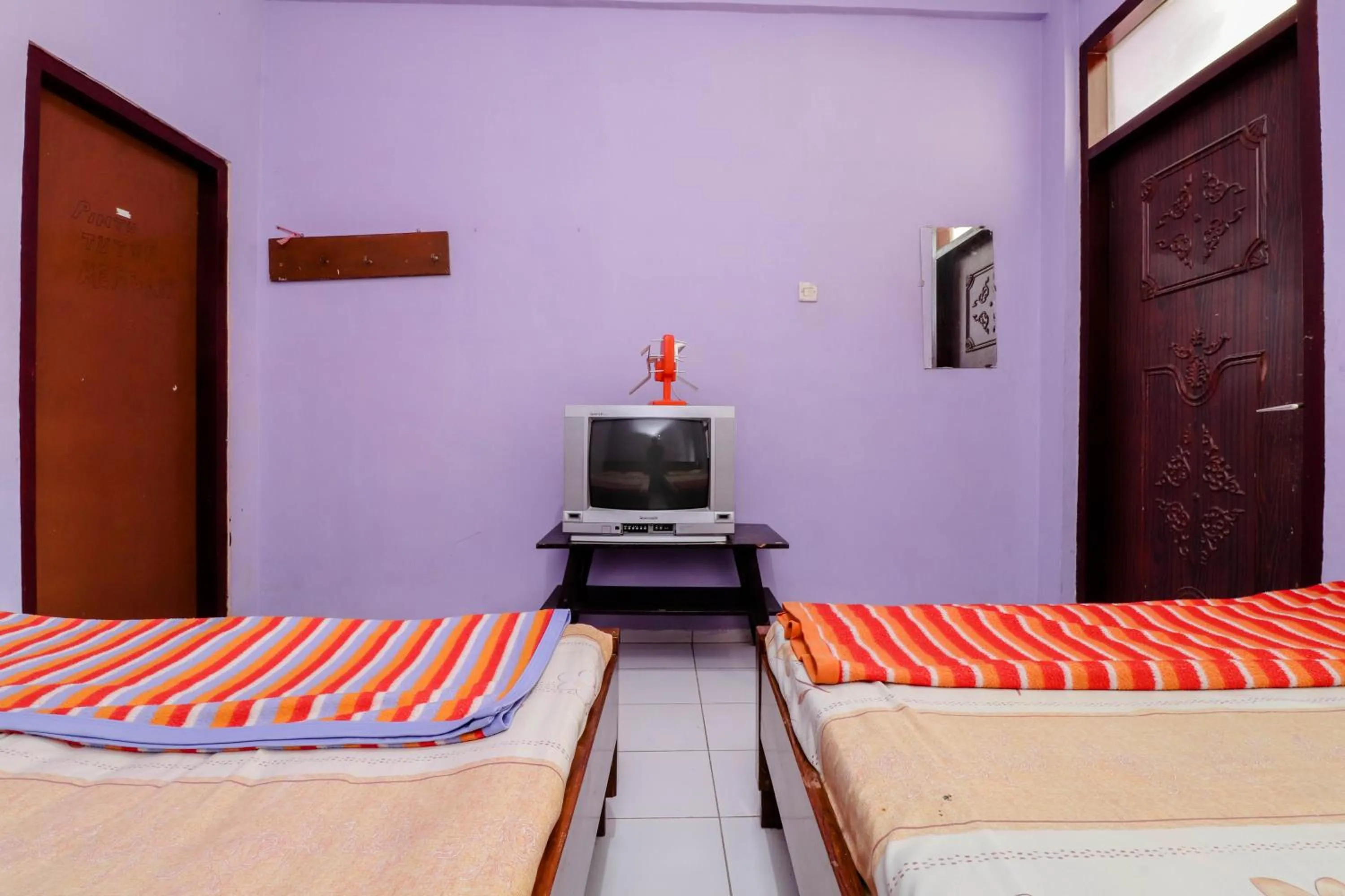 Bed in Penginapan Sedyo Rahayu